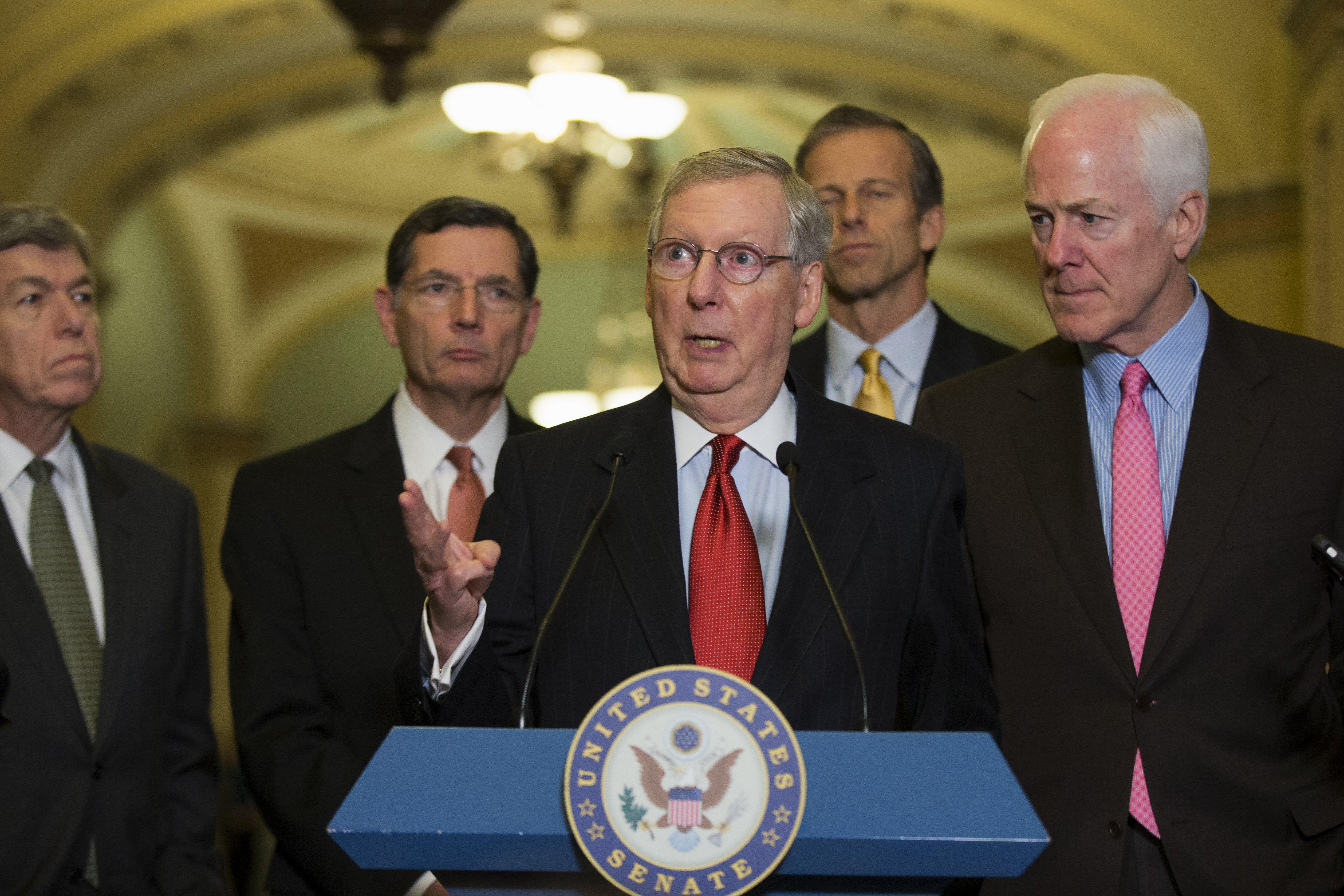 Senate Minority Leader Mitch McConnell of Ky., center, gestures during a news conference on Capitol Hill in Washington, Tuesday, Dec. 2, 2014. From left are, Sen. Roy Blunt, R-Mo., Sen. John Barrasso, R-Wyo., McConnell, Sen. John Thune, R-S.D., and Senate Minority Whip John Cornyn of Texas. (AP Photo/Evan Vucci) (AP)