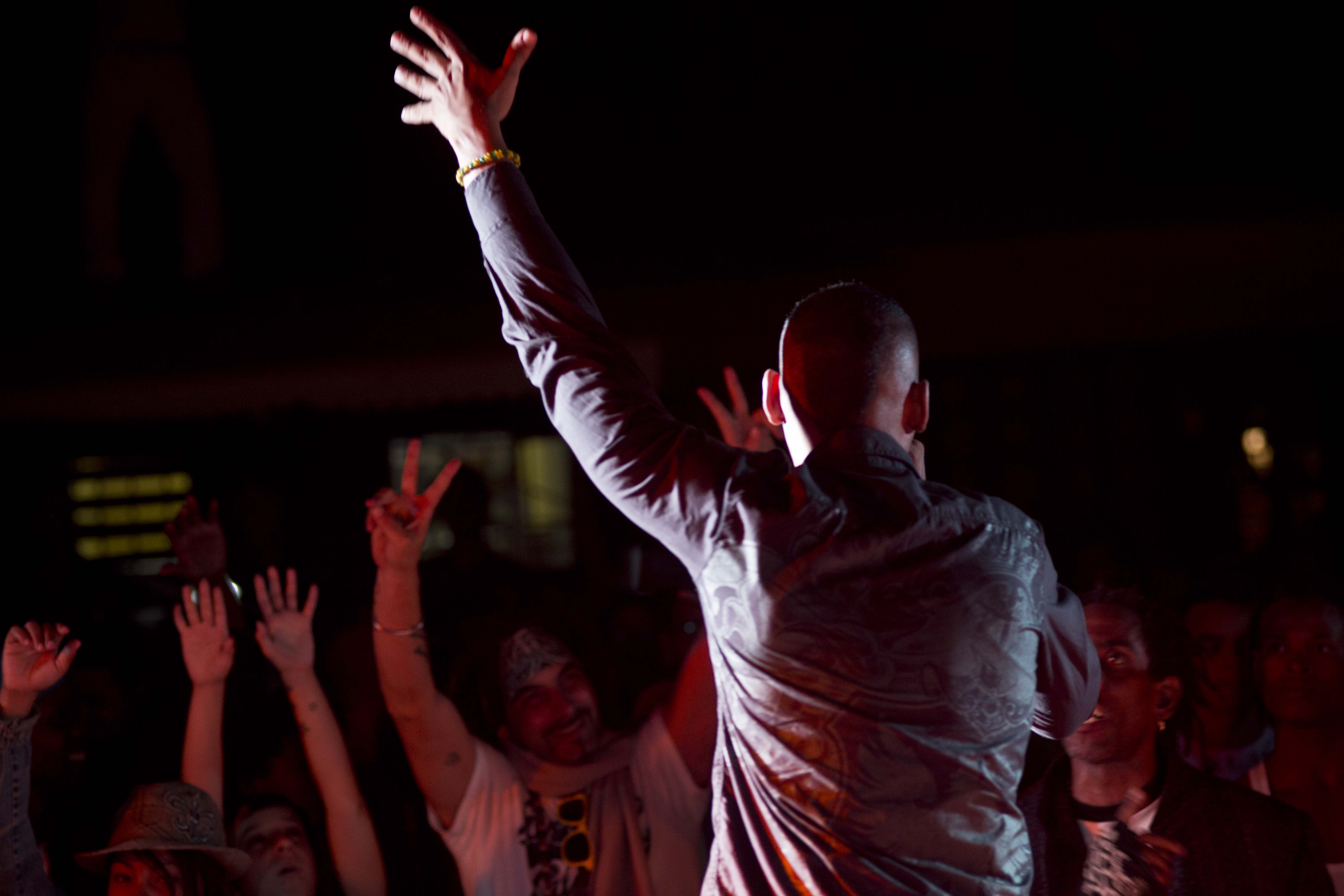 In this Nov. 30, 2014, photo, Cuban fans sing during a hip-hop concert in Havana. Documents obtained by The Associated Press show that a U.S. agency infiltrated Cuba's hip-hop scene, recruiting unwitting rappers to spark a youth movement against the government. (AP Photo/Ramon Espinosa) (AP)