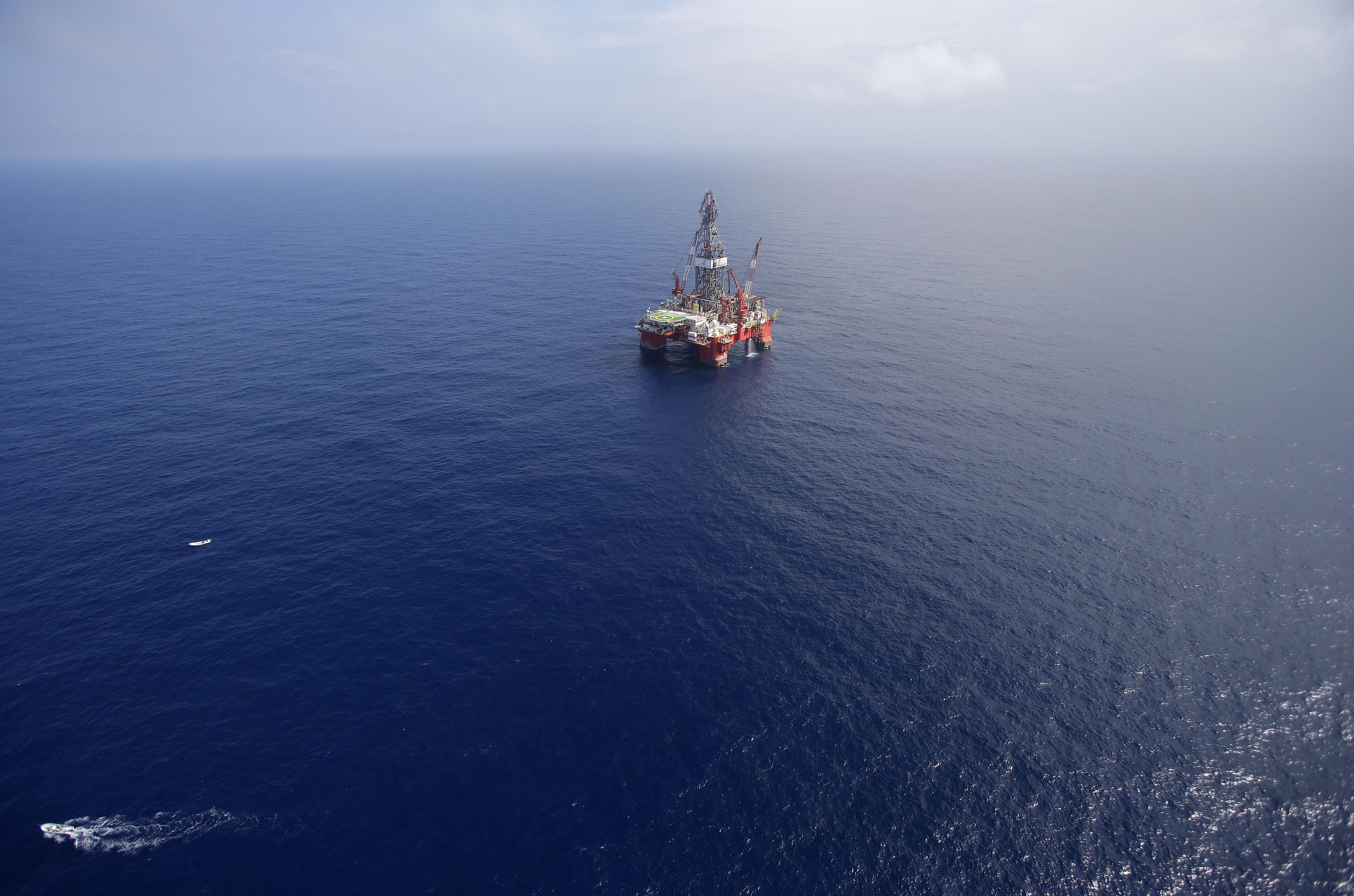 FILE - In this Nov. 22, 2013, file photo, the Centenario deep-water drilling platform stands off the coast of Veracruz, Mexico in the Gulf of Mexico.  (AP Photo/Dario Lopez-Mills, File) (AP)