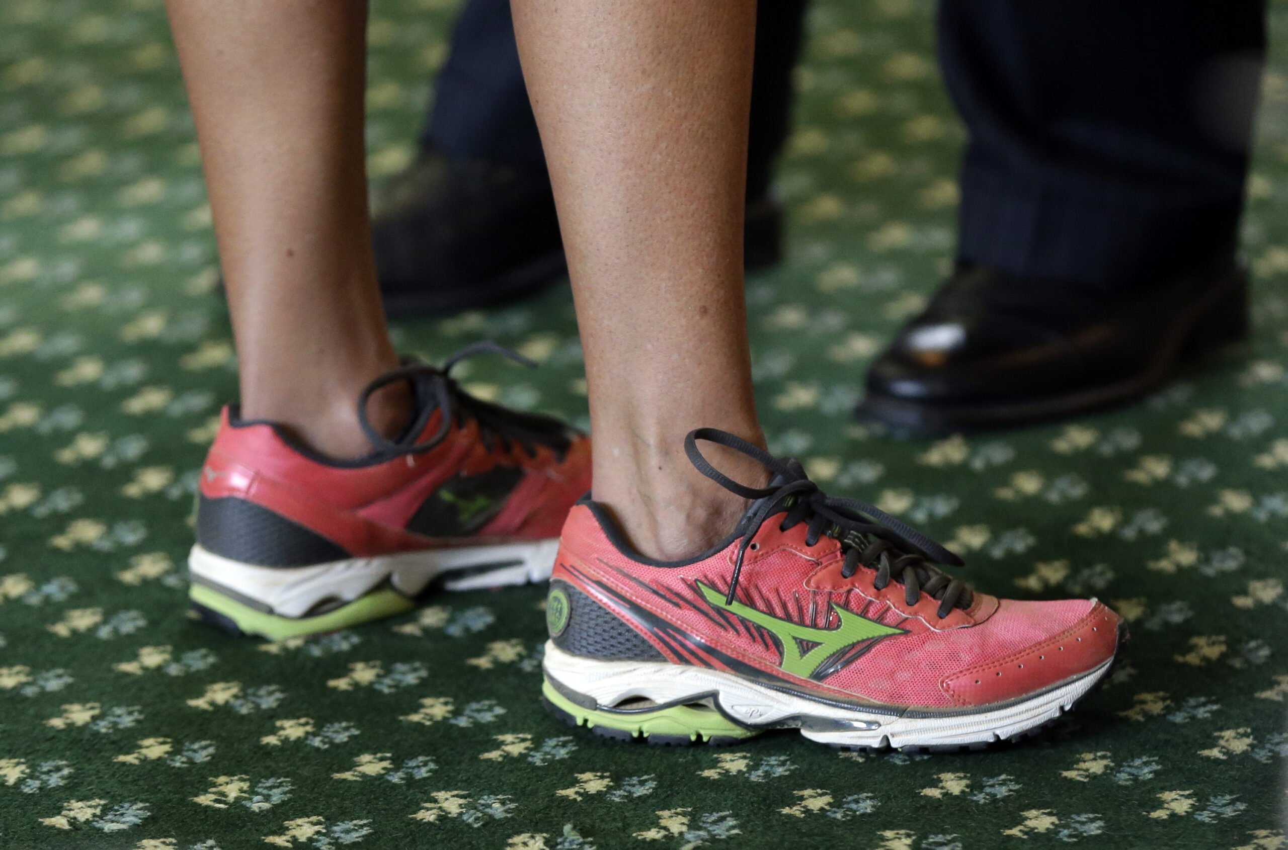 Sen. Wendy Davis, D-Fort Worth, wears running shoes as she filibusters in an effort to kill an abortion bill, Tuesday, June 25, 2013, in Austin, Texas. The bill would ban abortion after 20 weeks of pregnancy and force many clinics that perform the procedure to upgrade their facilities and be classified as ambulatory surgical centers.  (AP Photo/Eric Gay) (AP/Eric Gay)