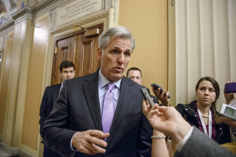 FILE - In this Nov. 17, 2014 file photo, House Majority Leader Kevin McCarthy of Calif., departs an orientation luncheon for newly-elected GOP members of the House, on Capitol Hill in Washington. The first Republican-controlled Congress to confront President Barack Obama takes charge on Tuesday, and GOP leaders are planning an agenda that focuses on cutting the budget and bolstering the economy _ and oh yes, avoiding self-inflicted calamities that make voters wonder if the party is capable of governing. (AP Photo/J. Scott Applewhite, File) (AP)