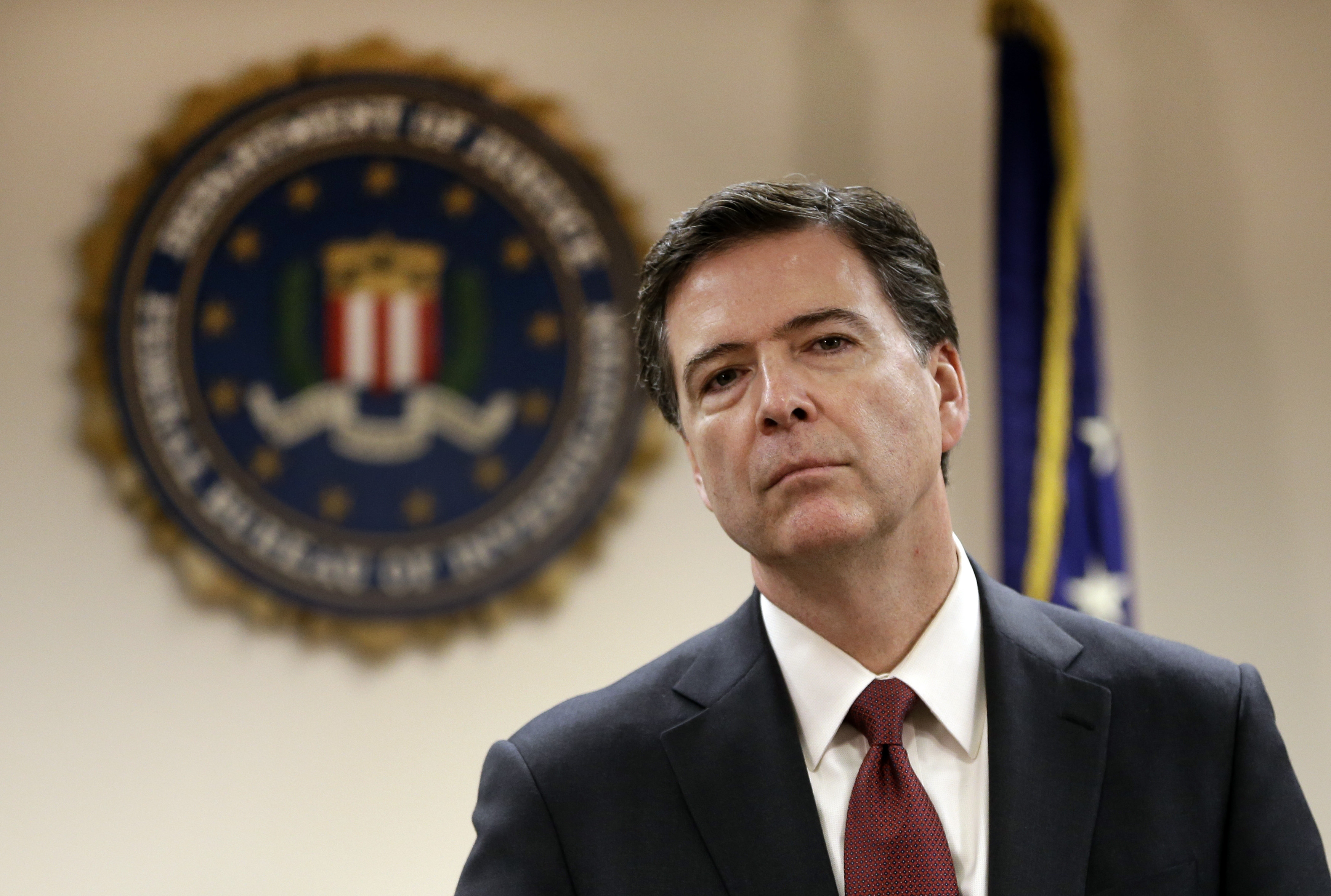 FILE - In this Feb. 27, 2014 file photo, Federal Bureau of Investigation Director James B. Comey listens to a question from a reporter during a media conference in San Francisco. The FBI director revealed new details Wednesday, Jan. 7, 2015, about the stunning cyberattack against Sony Pictures Entertainment Inc., part of the Obama administration's effort to challenge persistent skepticism about whether North Korea's government was responsible for the brazen hacking. Speaking at the International Conference on Cyber Security at Fordham University, FBI Director Comey revealed that the hackers "got sloppy" and mistakenly sent messages directly that could be traced to IP addresses used exclusively by North Korea. (AP Photo/Ben Margot, File) (AP)