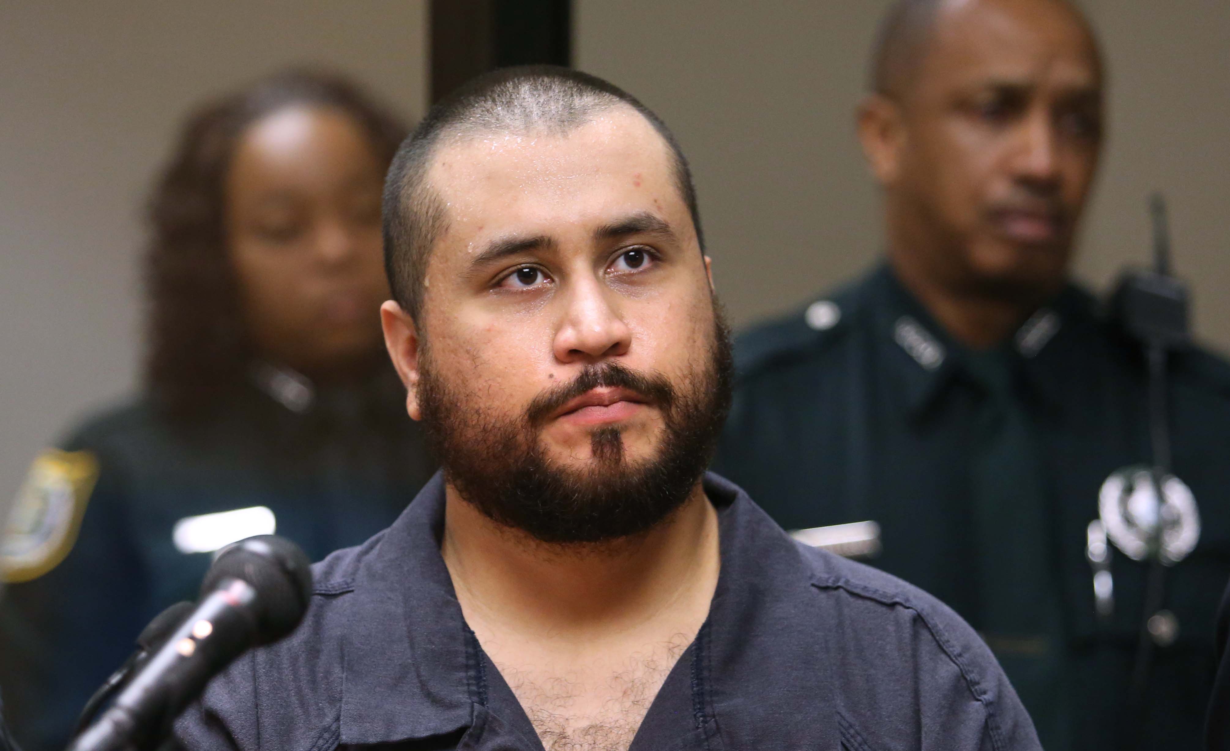 FILE - In this Tuesday, Nov. 19,  2013, file photo, George Zimmerman listens in court, in Sanford, Fla., during his hearing on charges including aggravated assault stemming from a fight with his girlfriend. The Seminole County Sheriff's Office says Zimmerman was arrested in Lake Mary, Friday, Jan. 9, 2015 on an aggravated assault charge, and is being held at the John E. Polk Correctional Facility. (AP Photo/Orlando Sentinel, Joe Burbank, Pool, File) (AP)
