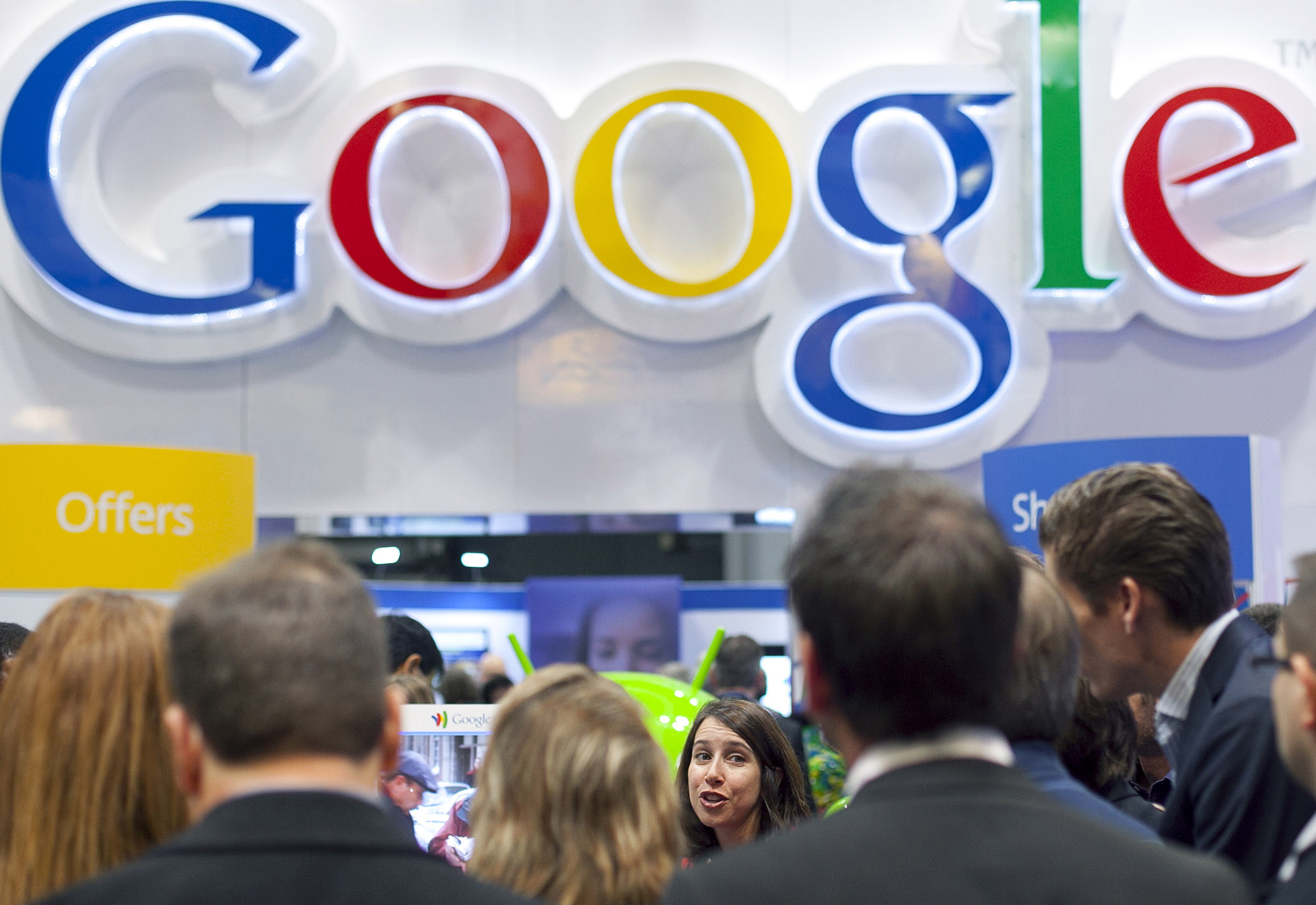 FILE - In this Jan. 17, 2012 file photo, attendees at the National Retail Federation listen to a discussion about Google Wallet, in New York. (AP/Mark Lennihan)