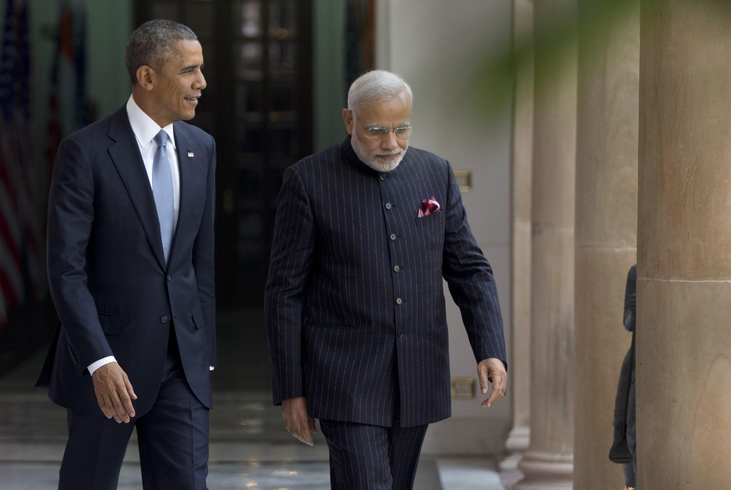 President Barack Obama walks with the Indian Prime Minister Narendra Modi to be photographed by media at the Hyderabad House in, New Delhi, India, Sunday, Jan. 25, 2015. (AP Photo/Carolyn Kaster) (Carolyn Kaster)
