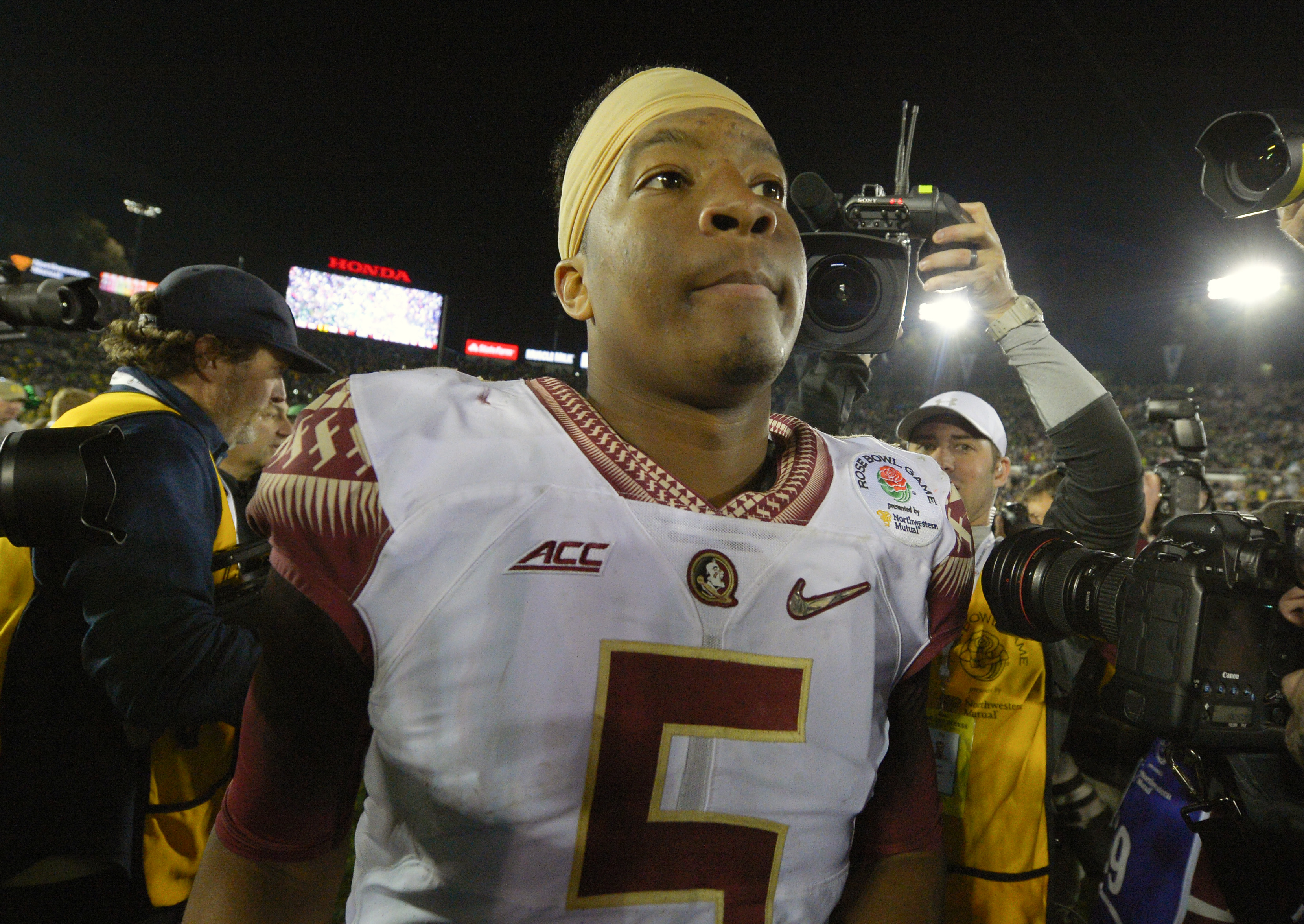 Florida State quarterback Jameis Winston walks off the field after their loss to Oregon during the Rose Bowl NCAA college football playoff semifinal, Thursday, Jan. 1, 2015, in Pasadena, Calif. (AP Photo/Mark J. Terrill) (AP)