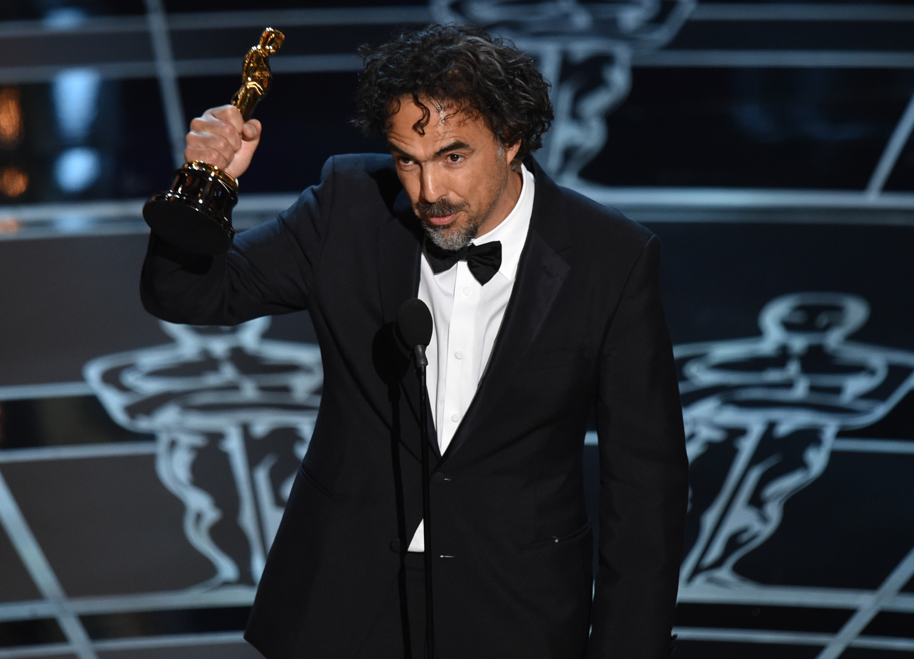 Alejandro G. Inarritu accepts the award for best director for Birdman or (The Unexpected Virtue of Ignorance) at the Oscars on Sunday, Feb. 22, 2015, at the Dolby Theatre in Los Angeles. (Photo by John Shearer/Invision/AP) (John Shearer/invision/ap)