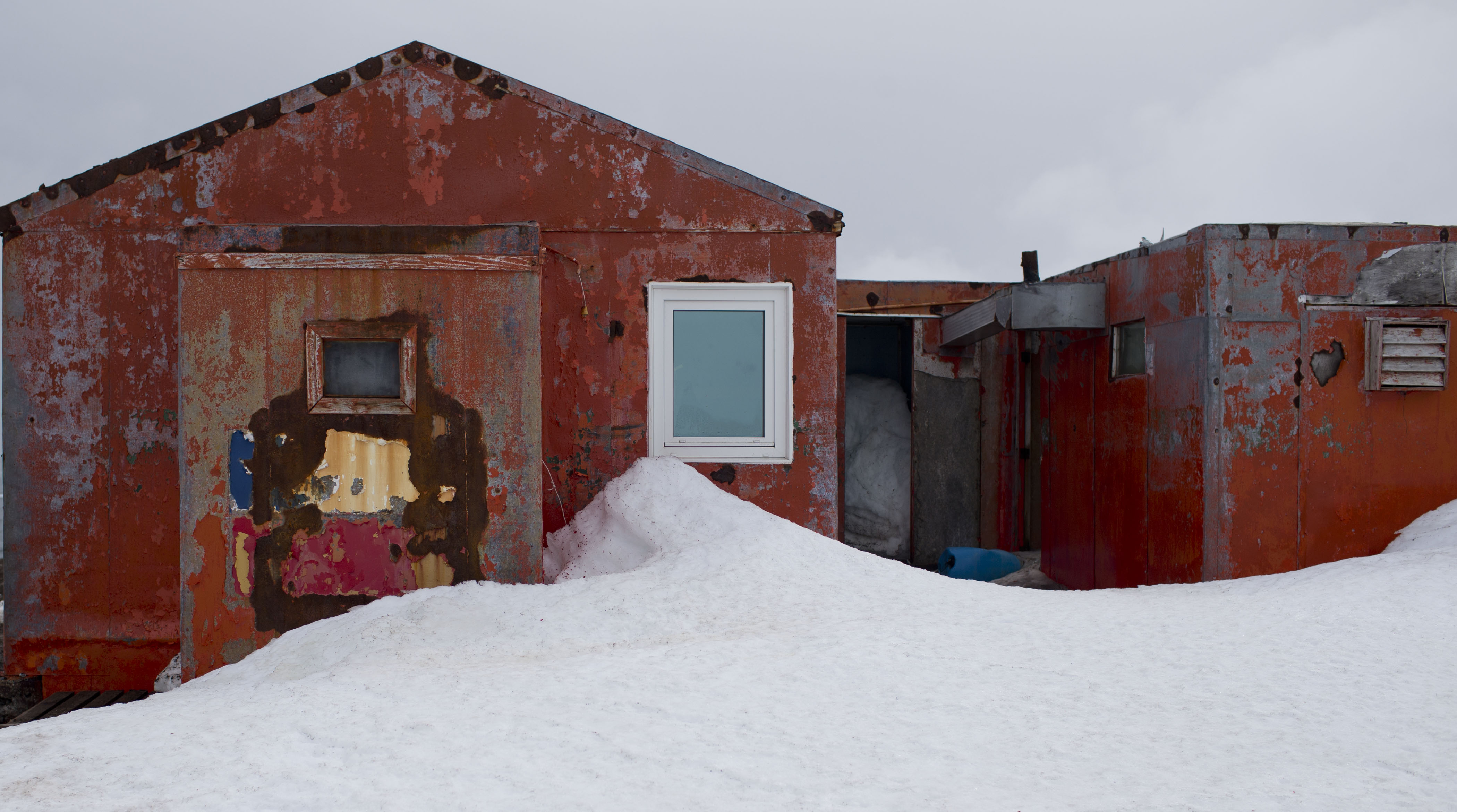 In this Jan. 24, 2015 photo, snow surrounds buildings used by Chile's scientists on Robert Island, part of the South Shetland Islands archipelago in Antarctica. Temperatures can range from above zero in the South Shetlands and Antarctic Peninsula to the unbearable frozen lands near the South Pole.(AP Photo/Natacha Pisarenko) (AP)