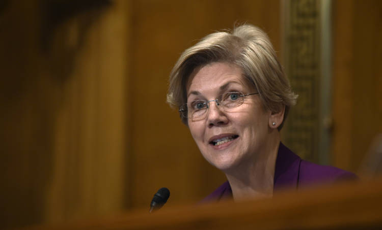 FILE - In this Jan. 21, 2015 file photo, Sen. Elizabeth Warren, D-Mass. speaks on Capitol Hill in Washington. The rich arent taxed enough and the middle-class is taxed too much. As for your taxes, you probably think theyre too high as well. Those are the results of a new Associated Press-GfK poll, which found that most Americans support President Barack Obamas proposal to raise investment taxes on high-income families. The findings echo the populist messages of Sens. Elizabeth Warren and Bernie Sanders, two liberals being courted by the progressive wing of the Democratic Party to run for president in 2016. The findings also add weight to Obamas new push to raise taxes on the rich and use some of the revenue to lower taxes on the middle class.  (AP Photo/Susan Walsh, File) (AP/Susan Walsh)