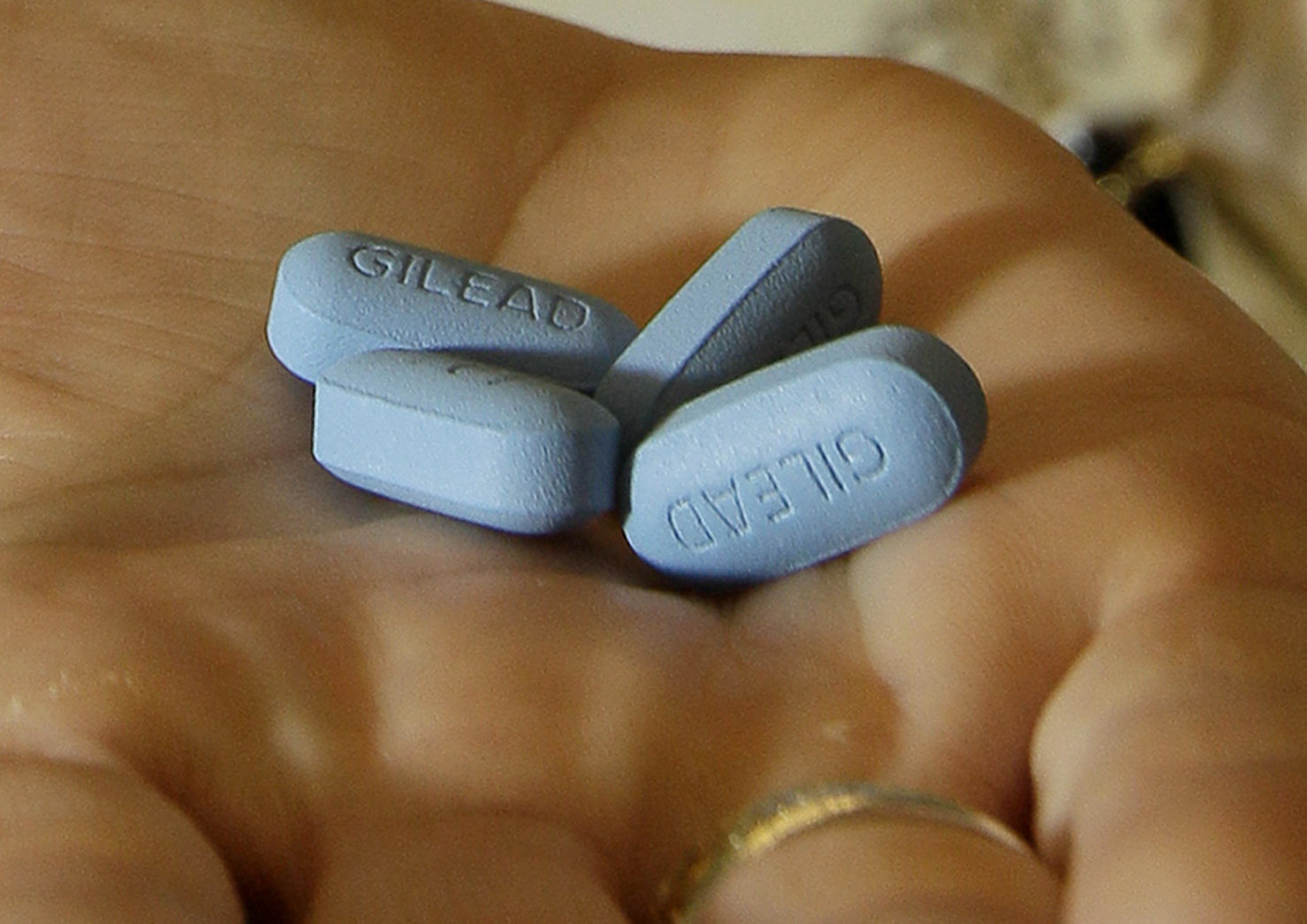 A doctor holds Truvada pills at her office in San Francisco. (AP Photo/Jeff Chiu)