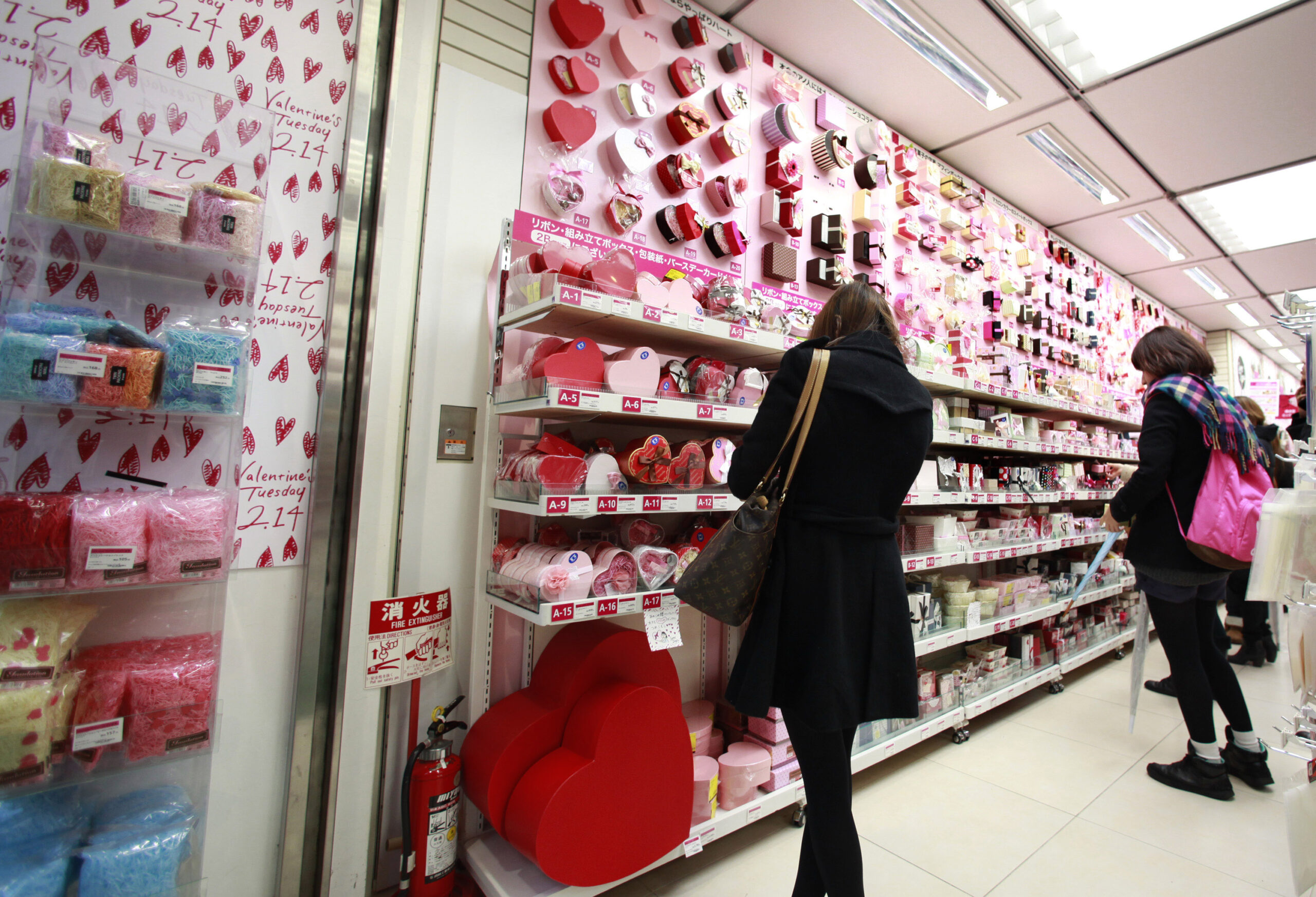 Shoppers choose chocolate in Tokyo. (AP Photo/Shizuo Kambayashi) (Shizuo Kambayashi)