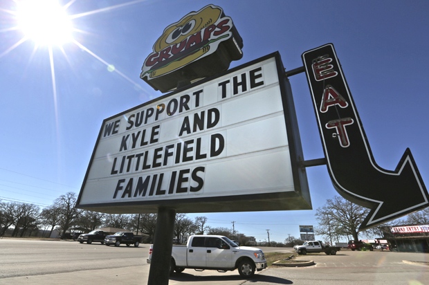 A sign displaying support for the families of Chris Kyle and Chad Littlefield, Feb. 10, 2015, in Stephenville, Texas. (AP/Lm Otero)