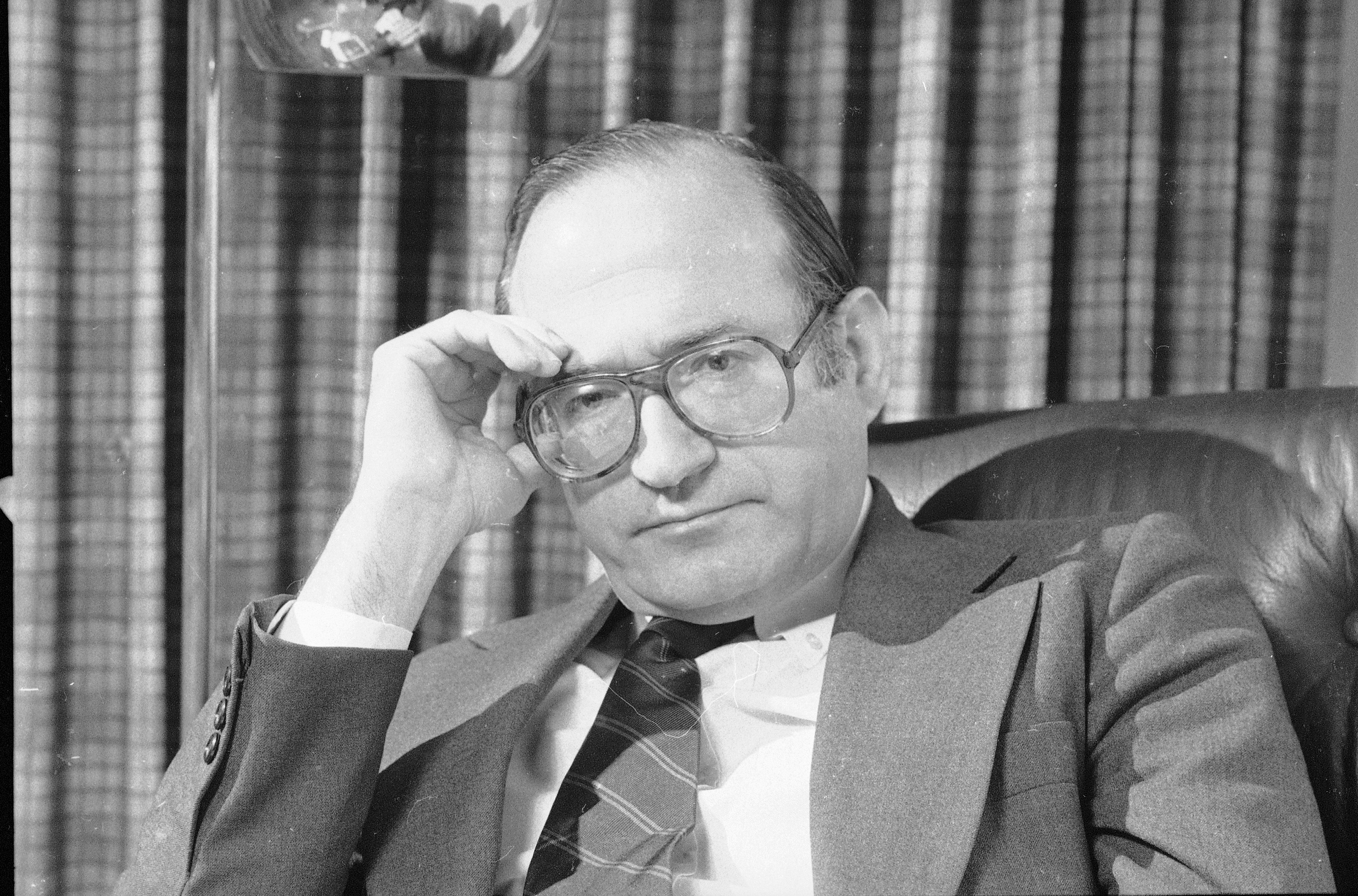 FILE - In this April 25, 1979, file photo, Dr. Ernest Sternglass, a professor of radiological physics at the University of Pittsburgh School of Medicine, talks about the dosimeters worn by workers and newsmen during the crisis at Three Mile Island, in Pittsburgh. Sternglass, whose research helped make it possible for the world to see the first moon walk, has died at age 91 of heart failure. Sternglass died Feb. 12, 2015, in Ithaca, N.Y., Cornell University said. His research helped lead to a sensitive television camera tube that captured low-light lunar action during the 1969 moon landing and U.S. astronaut Neil Armstrong's historic first steps. (AP Photo/File) (AP)