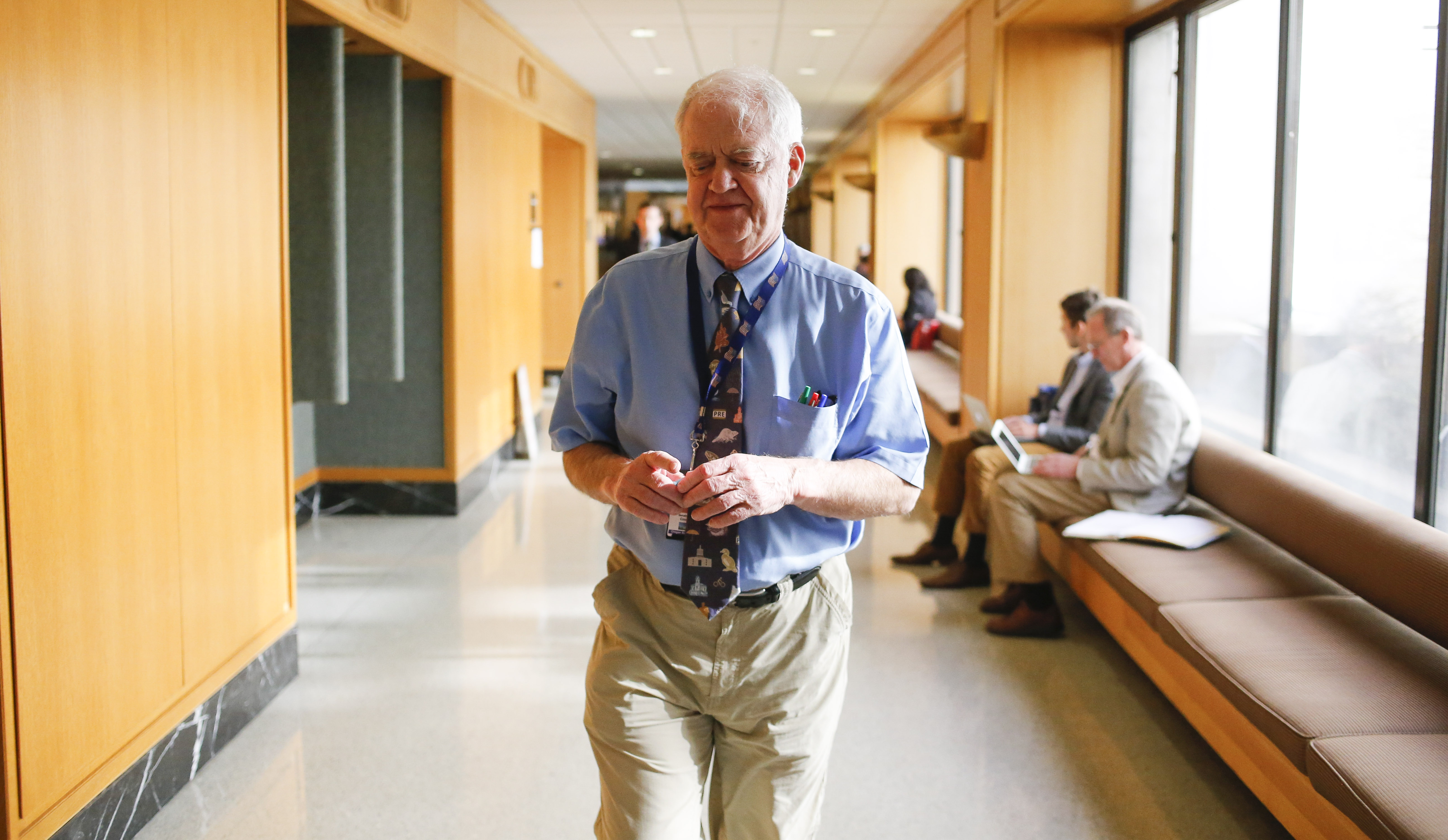 Oregon Senate President Peter Courtney walks the hallways of the Capitol after a news conference on Thursday, Feb. 12, 2015. (AP Photo/Timothy J. Gonzalez) (AP)