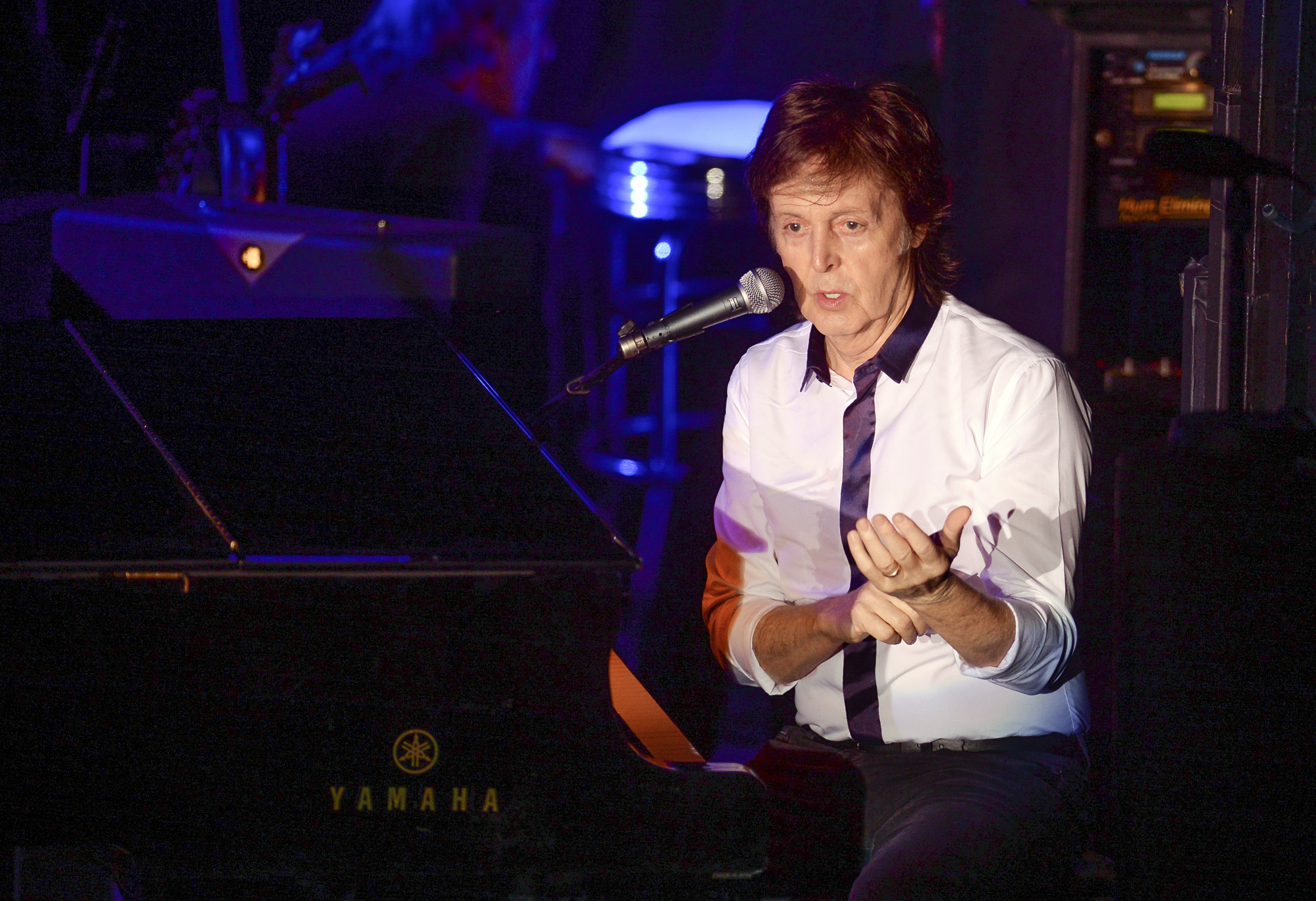 Paul McCartney and his band perform a secret Valentine's Day concert at Irving Plaza on Saturday, Feb. 14, 2015, in New York. (Photo by Evan Agostini/Invision/AP) (Evan Agostini/invision/ap)