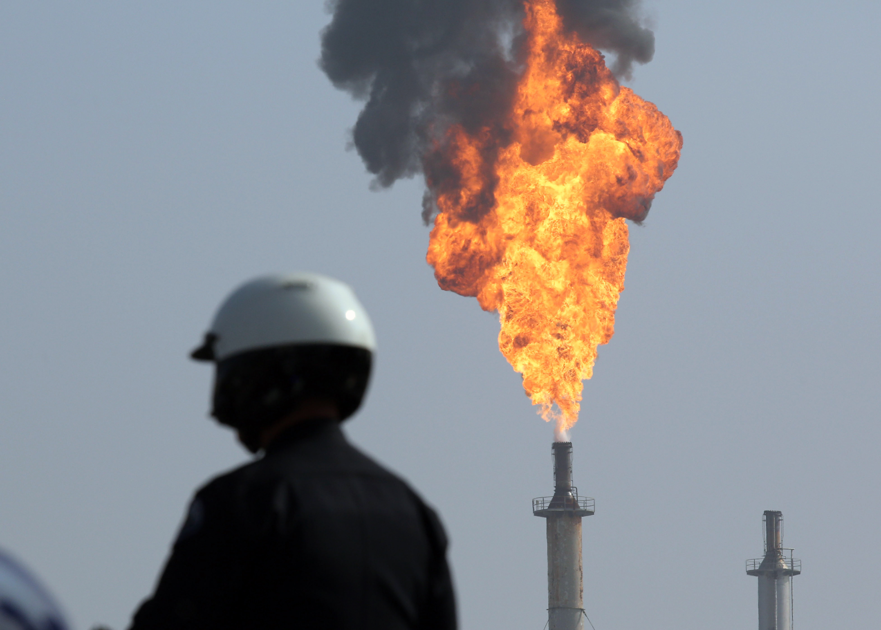 A very large smokestack flare burns off flammable product after an explosion in a processing facility at the ExxonMobil refinery in Torrance, Calif. on Wednesday, Feb. 18, 2015. A similar fire engulfed a Philadelphia Energy Solutions refinery in Philadelphia, Pennsylvania, on June 21, 2019. (AP Photo/Daily Breeze, Chuck Bennett) (AP)
