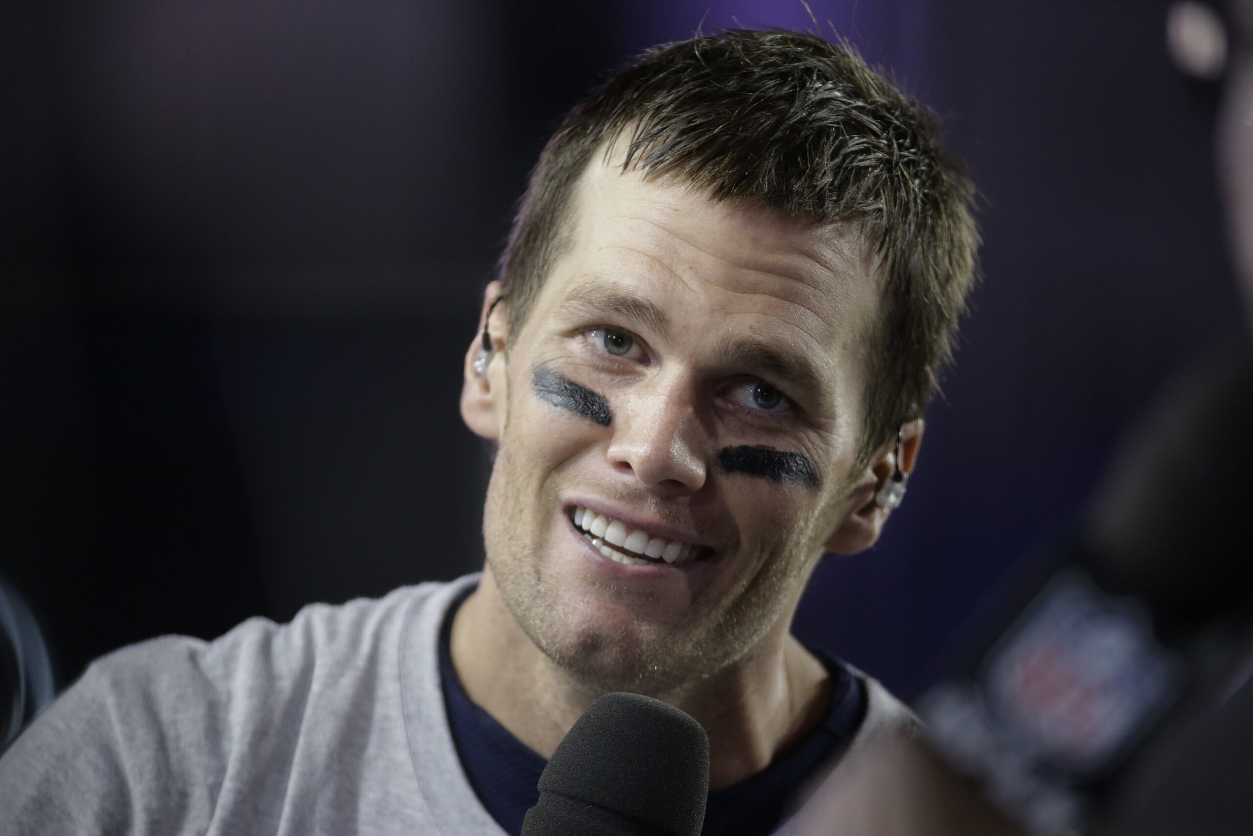 New England Patriots quarterback Tom Brady (12) responds to questions during a news interview after the NFL Super Bowl XLIX football game against the Seattle Seahawks Sunday, Feb. 1, 2015, in Glendale, Ariz. The Patriots won the game 28-24. (AP/Mark Humphrey)