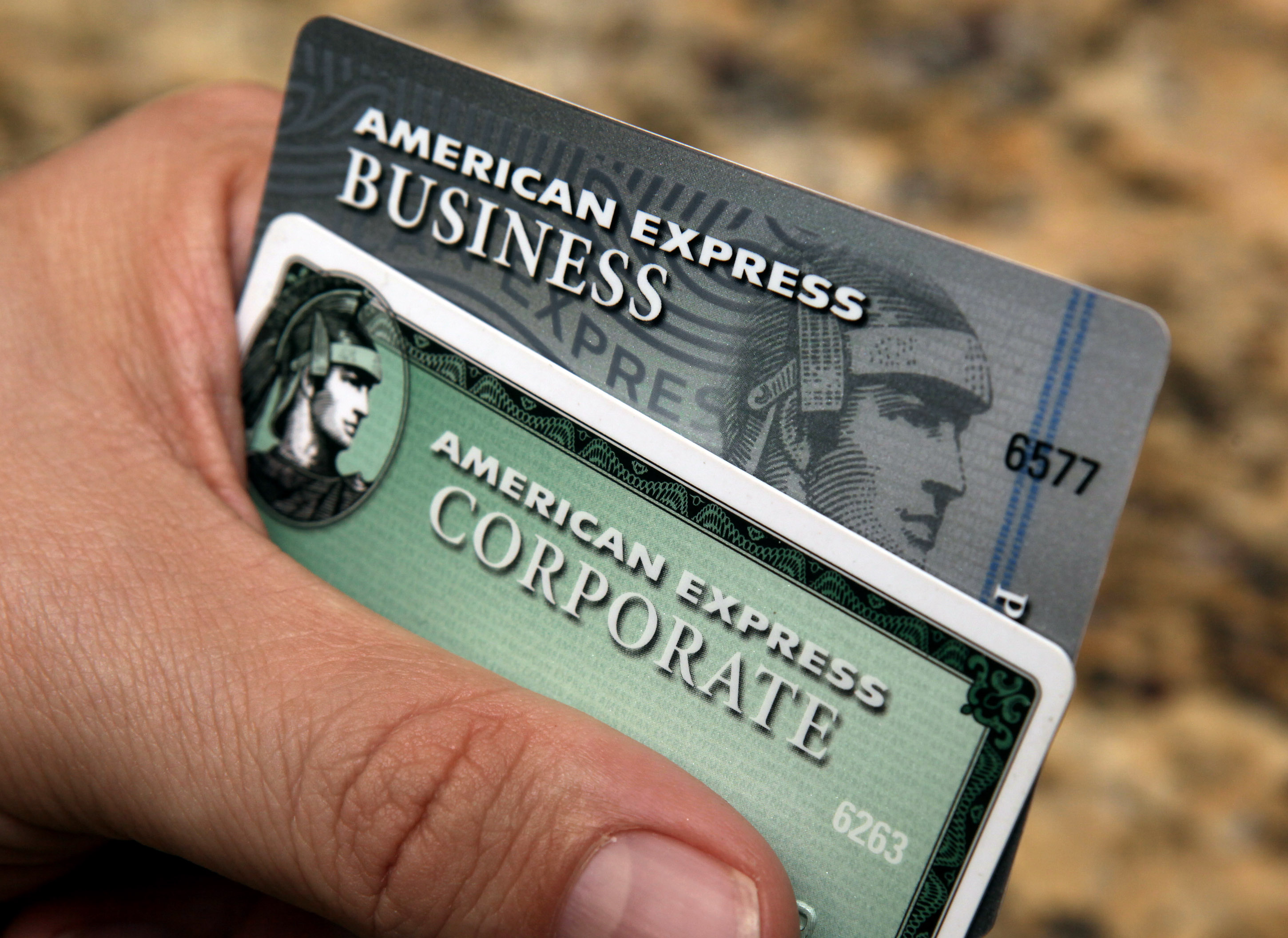 FILE - In this Jan. 20, 2010 file photo, American Express cards are posed for a photograph in Phoenix. Amexs stock is down 11 percent this year, making it the second-biggest decliner on the Dow Jones industrial average. (AP Photo/Ross D. Franklin, File) (AP)