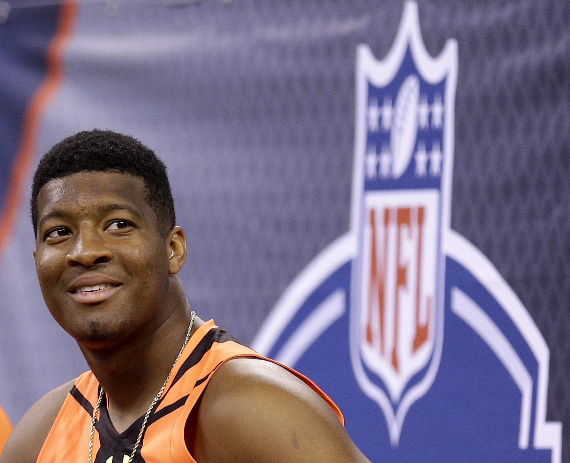 FILE - This is a Feb. 21, 2015, file photo showing Jameis Winston at the NFL football scouting combine in Indianapolis. Winston has spent much of the past two months crisscrossing the nation, sharpening his quarterback skills and trying to convince NFL teams he's learned from mistakes made off the field and ready to become the face of a franchise. (AP Photo/David J. Phillip, File) (AP)