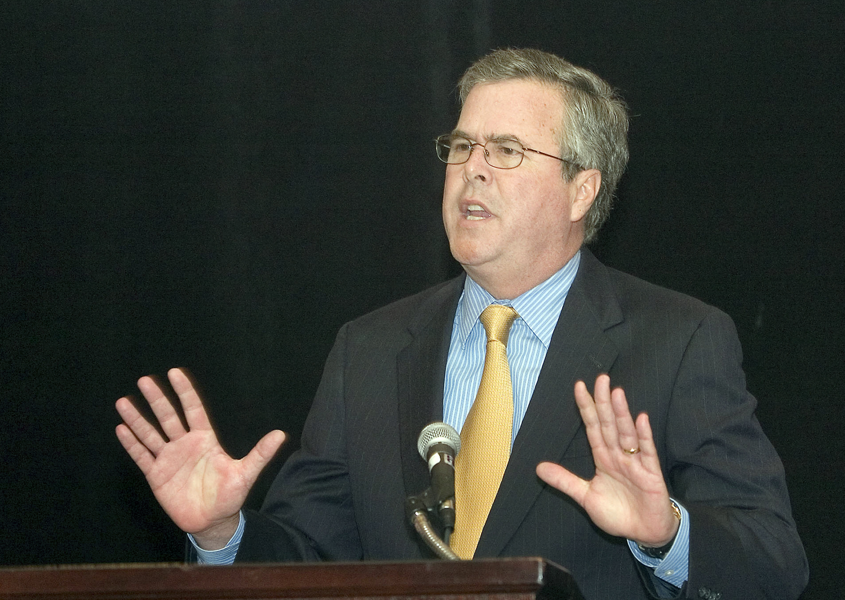 FILE - In this May 26, 2006, file photo, then-Florida Gov. Jeb Bush speaks to a mostly Republican audience at the 58th Annual Lincoln Day Dinner at the Hilton Miami Airport Hotel in Miami. Among the many thousands of emails Bush received as Florida governor are a string of notes from campaign donors asking for favors and making suggestions. Invariably, Bush responded politely. Sometimes, he appointed a person a donor had recommended. Other times, he rejected their advice about a piece of legislation. Its an insight into Bushs work as governor that's only possible because his emails are available for review, something not yet possible for those sent and received by Hillary Rodham Clinton as secretary of state. (AP Photos/Mitchell Zachs, File) (AP)