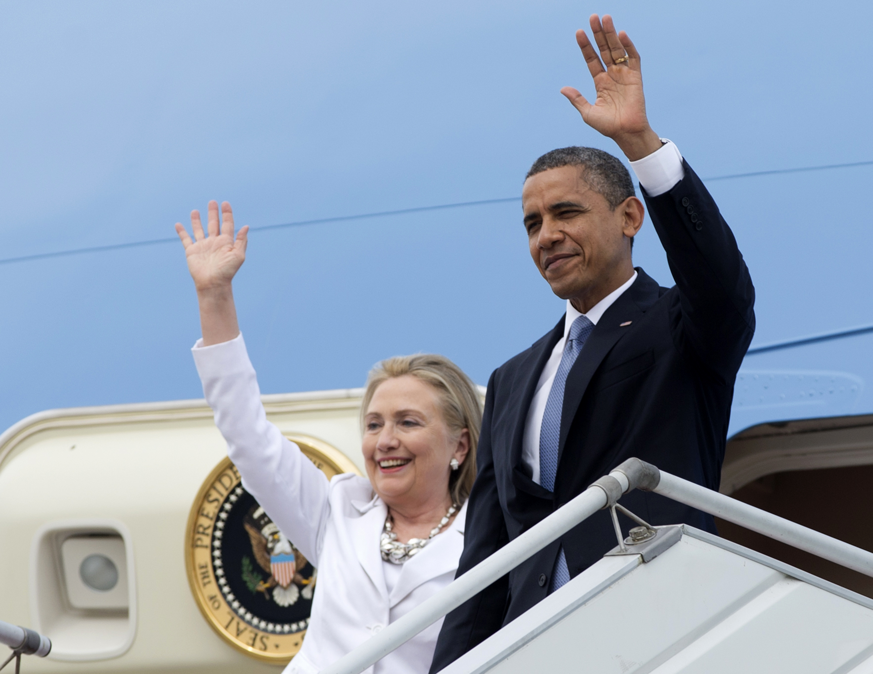 FILE - In this Nov. 19, 2012 file photo, President Barack Obama and then-Secretary of State Hillary Rodham Clinton wave as they arrive at Yangon International Airport in Yangon, Myanmar on Air Force One. President Barack Obama had some advice for Hillary Rodham Clinton. "If she's her wonderful self, I'm sure she's going to do great." Sounds simple, but friends say Clinton has never shown voters her true self. Mitt Romney couldn't shake the stereotype of callous rich guy. Rand Paul acknowledges he's got to learn how to hold back his temper. Policy is important, but when running for president, figuring out how to fit your personality to politics matters just as much. (AP Photo/Carolyn Kaster, File) (AP)