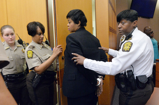 Former Deerwood Academy assistant principal Tabeeka Jordan is led to a holding cell after a jury found her guilty, April 1, 2015, in Atlanta. (AP/Kent D. Johnson)