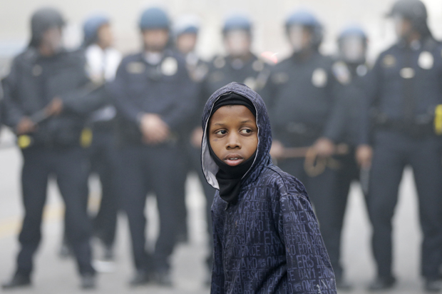 Police move a protester back, Baltimore, April 27, 2015. (AP/Matt Rourke)
