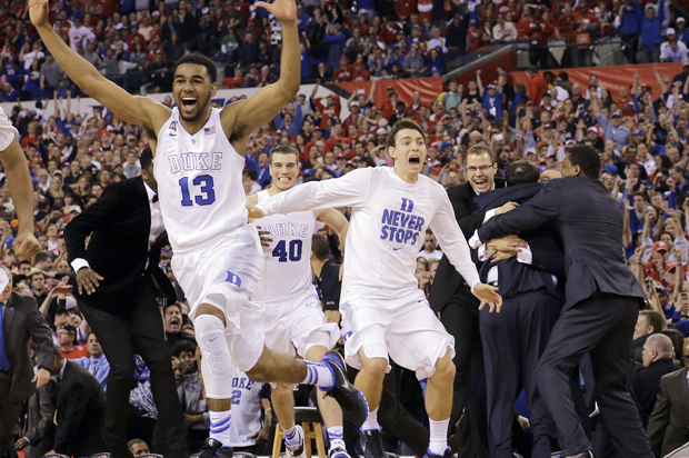 Duke players celebrate after the NCAA college basketball tournament championship game against Wisconsin, April 6, 2015, in Indianapolis. (AP/David J. Phillip)