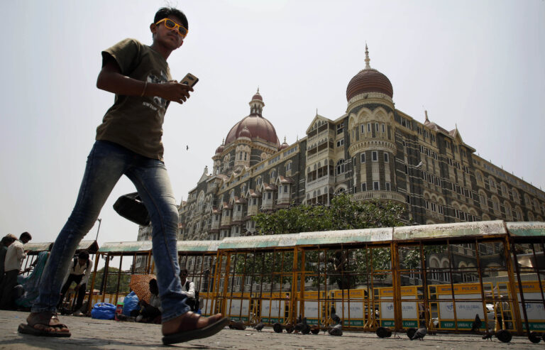 An Indian man walks outside the Taj Mahal hotel, which was one of the sites of the Mumbai terror attack, in Mumbai, India, Friday, April 10, 2015. A Pakistani court on Thursday, April 9, 2015, ordered the release of the main suspect Zaki-ur-Rehman Lakhvi in the 2008 Mumbai attacks for the second time in less than a month, a defense lawyer said. (AP Photo/Rajanish Kakade) (Rajanish Kakade)