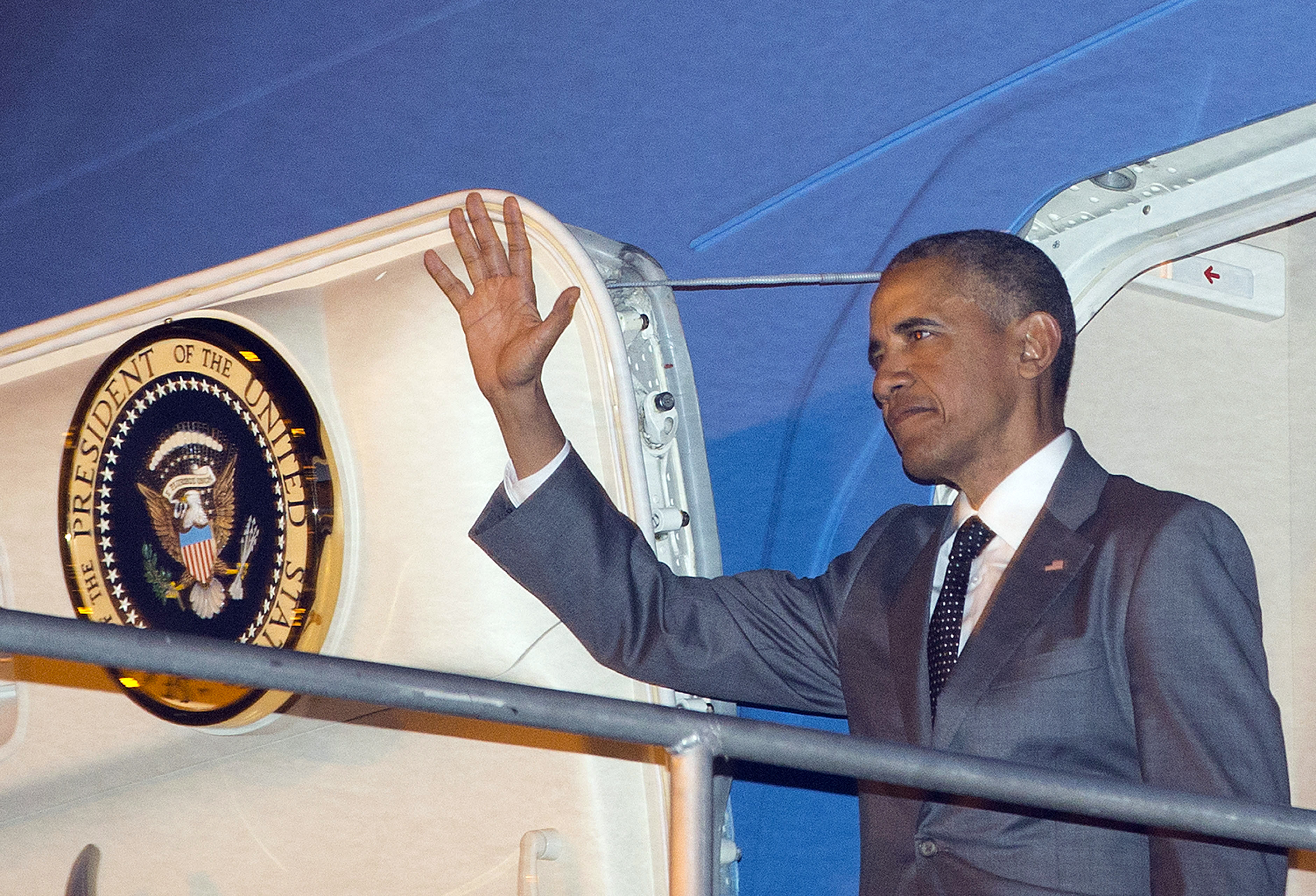 U.S. President Barack Obama waves during his arrival on Air Force One Thursday, April 9, 2015, at Tocumen International Airport in Panama City, Panama. (AP Photo/Pablo Martinez Monsivais) (AP)