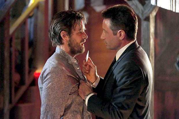 Gethin Anthony as Charles Manson, David Duchovney as Sam Hodiak in "Aquarius" (NBC)