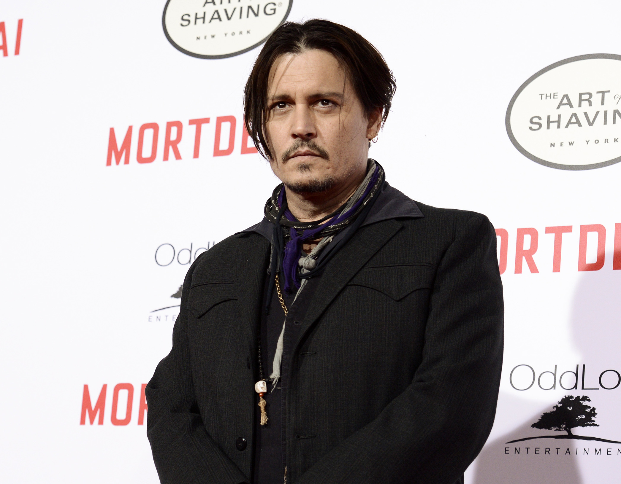 FILE - In this Jan. 25, 2015 file photo, actor Johnny Depp attends the premiere of the feature film "Mortdecai" in Los Angeles. (Photo by Dan Steinberg/Invision/AP, File)