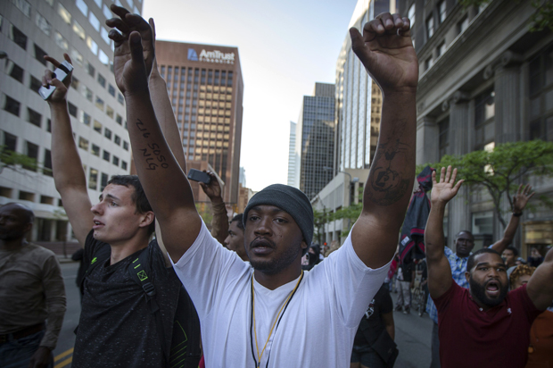 Demonstrators march against the acquittal of Michael Brelo, May 23, 2015, in Cleveland. (AP/John Minchillo)