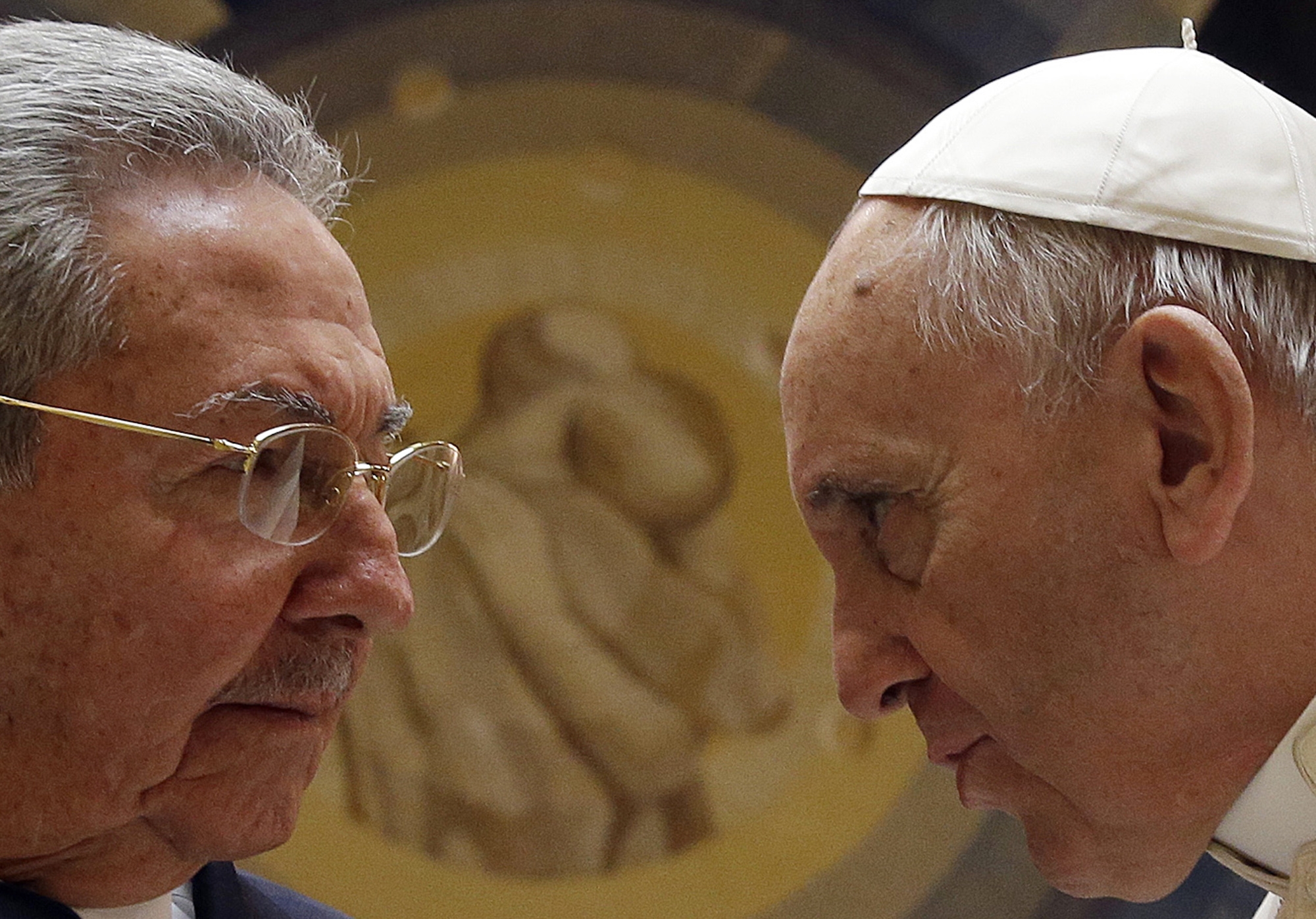 FILE - In this file photo released on Monday, May 11, 2015, Pope Francis meets Cuban President Raul Castro during a private audience at the Vatican, Sunday, May 10, 2015. Cuban President Raul Castro has been welcomed at the Vatican by Pope Francis, who played a key role in the breakthrough between Washington and Havana aimed at restoring U.S.-Cuban diplomatic ties. (Gregorio Borgia, File Pool Photo via AP) (AP)