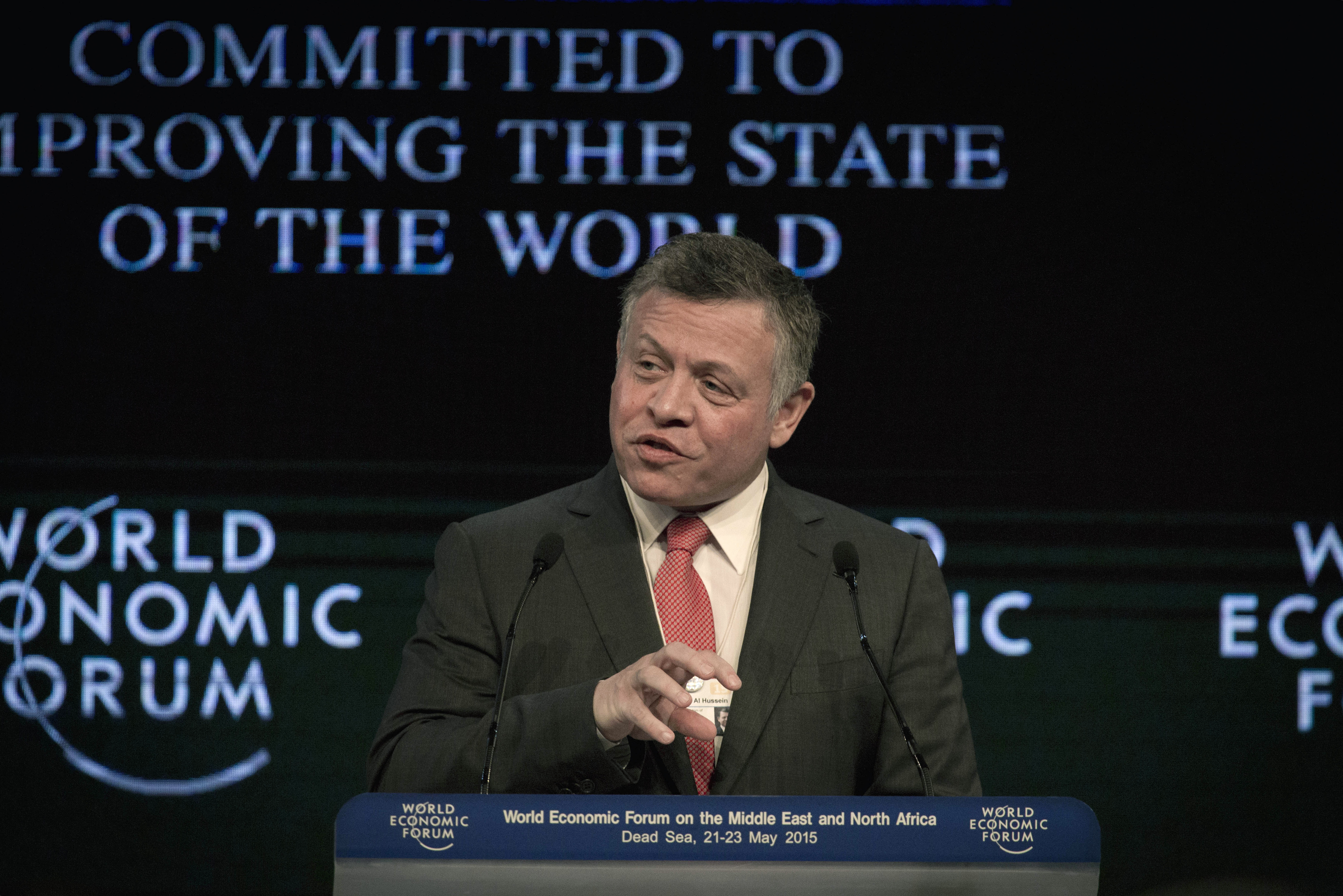 King Abdullah II of Jordan addresses the audience during the opening session of the World Economic Forum at the King Hussein convention center, Southern Shuneh, Jordan, Friday, May 22, 2015. Top political and business leaders are coming together in the Middle East at a regional World Economic Forum conference to search for solutions to widespread joblessness, which has created fertile ground for the recruitment of desperate youths by militants.  () (AP Photo/Nasser Nasser)