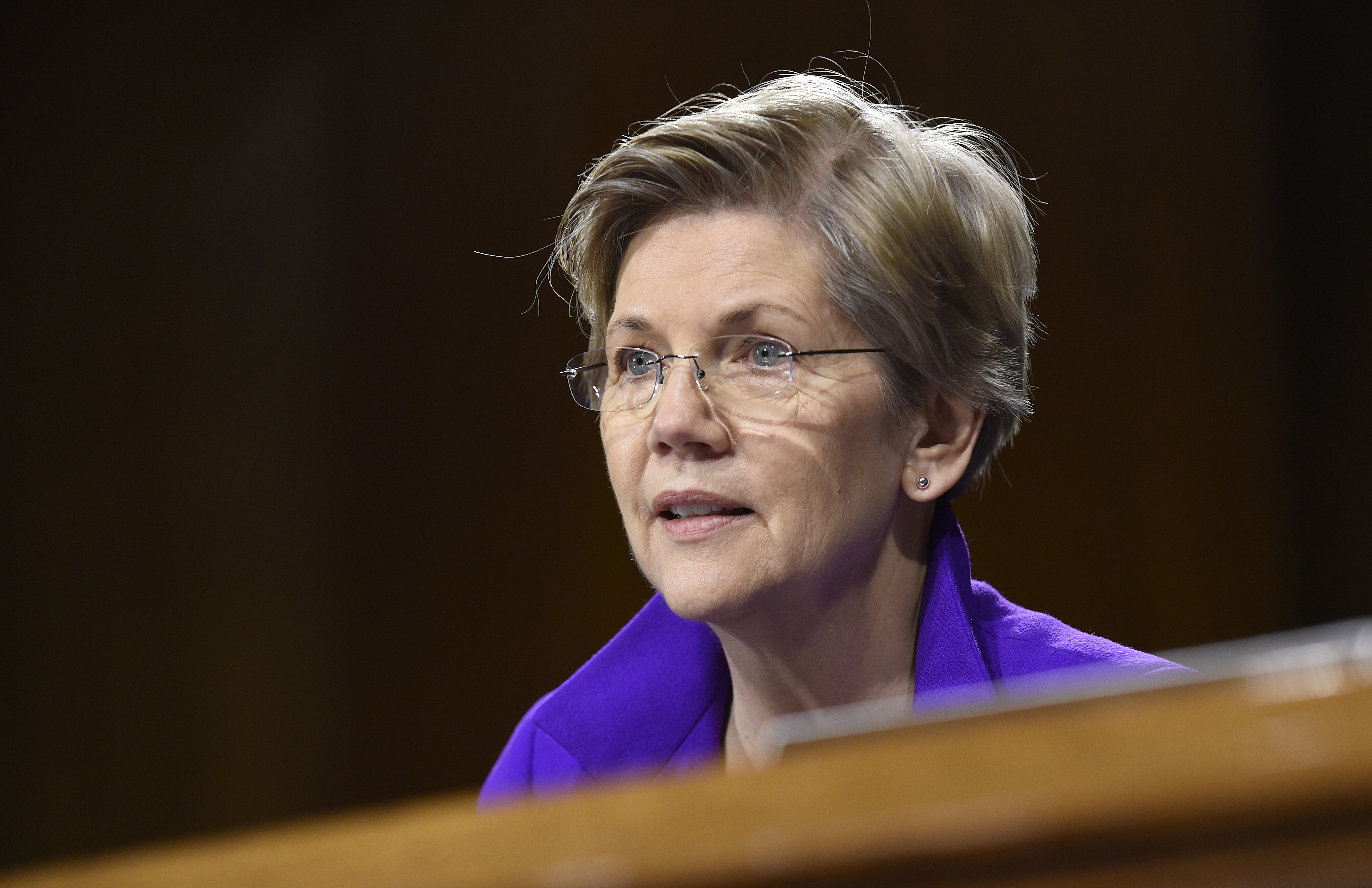 FILE - In this Feb. 24, 2015 file photo, Sen. Elizabeth Warren, D-Mass. is seen on Capitol Hill in Washington. Senate leaders said Tuesday that Democrats have enough votes to block action on President Barack Obama's trade initiatives unless the parties can work out disagreements on how to package various bills. Democratic Sen. Sherrod Brown of Ohio, a strong opponent of Obamas trade agenda, said Democrats have more than enough votes to block action for now. Senate Majority Leader Mitch McConnell, a Kentucky Republican, agreed.  (AP Photo/Susan Walsh, File) (AP)