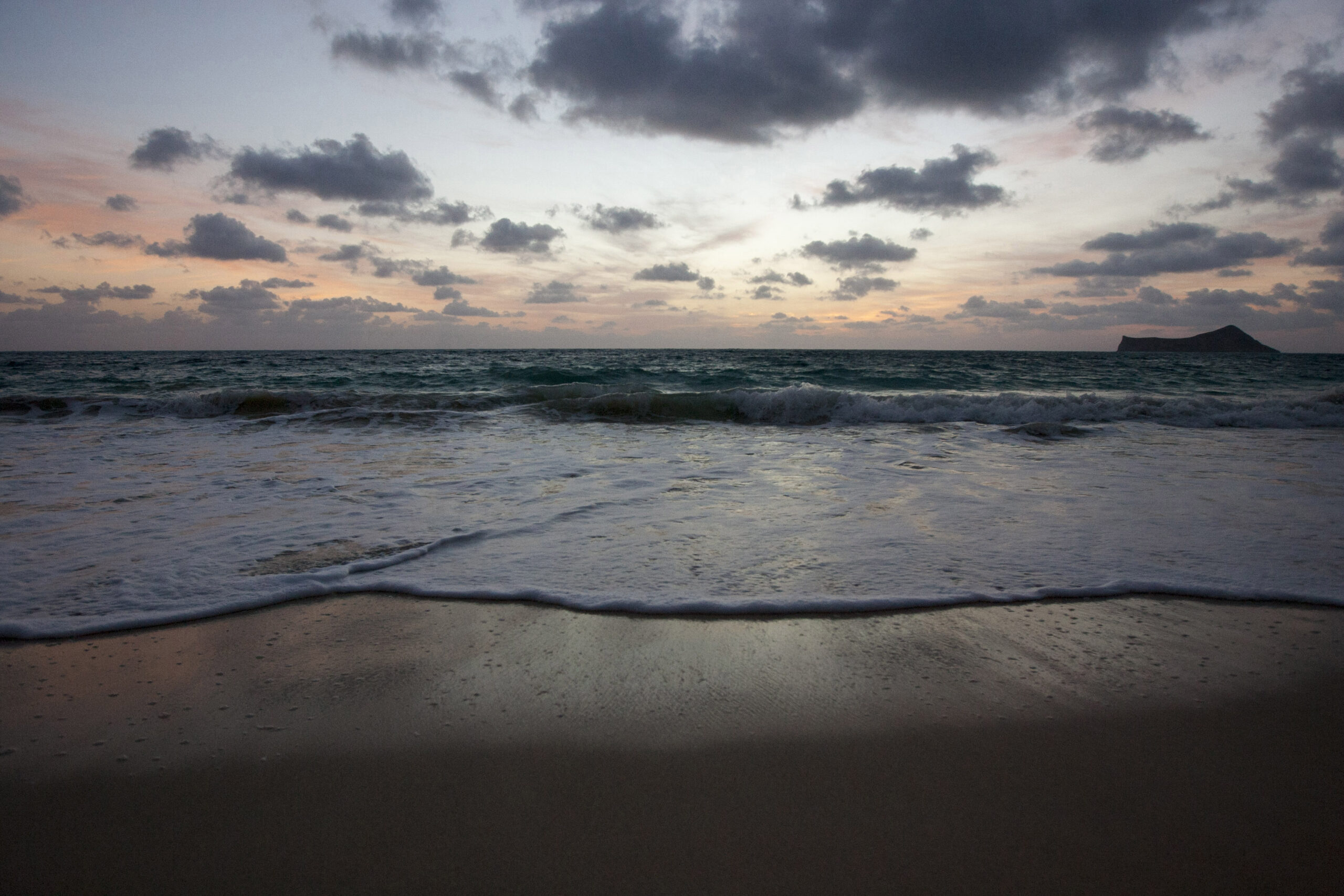 ** HOLD FOR CAROLYN LESSARD â HARD EMBARGO FOR THURSDAY AT 4 P.M. EST  â DO NOT MOVE ** The sun rises over Waimanalo Bay in Waimanalo, Hawaii, Tuesday, May 19, 2015. (AP Photo/Caleb Jones) (Caleb Jones)