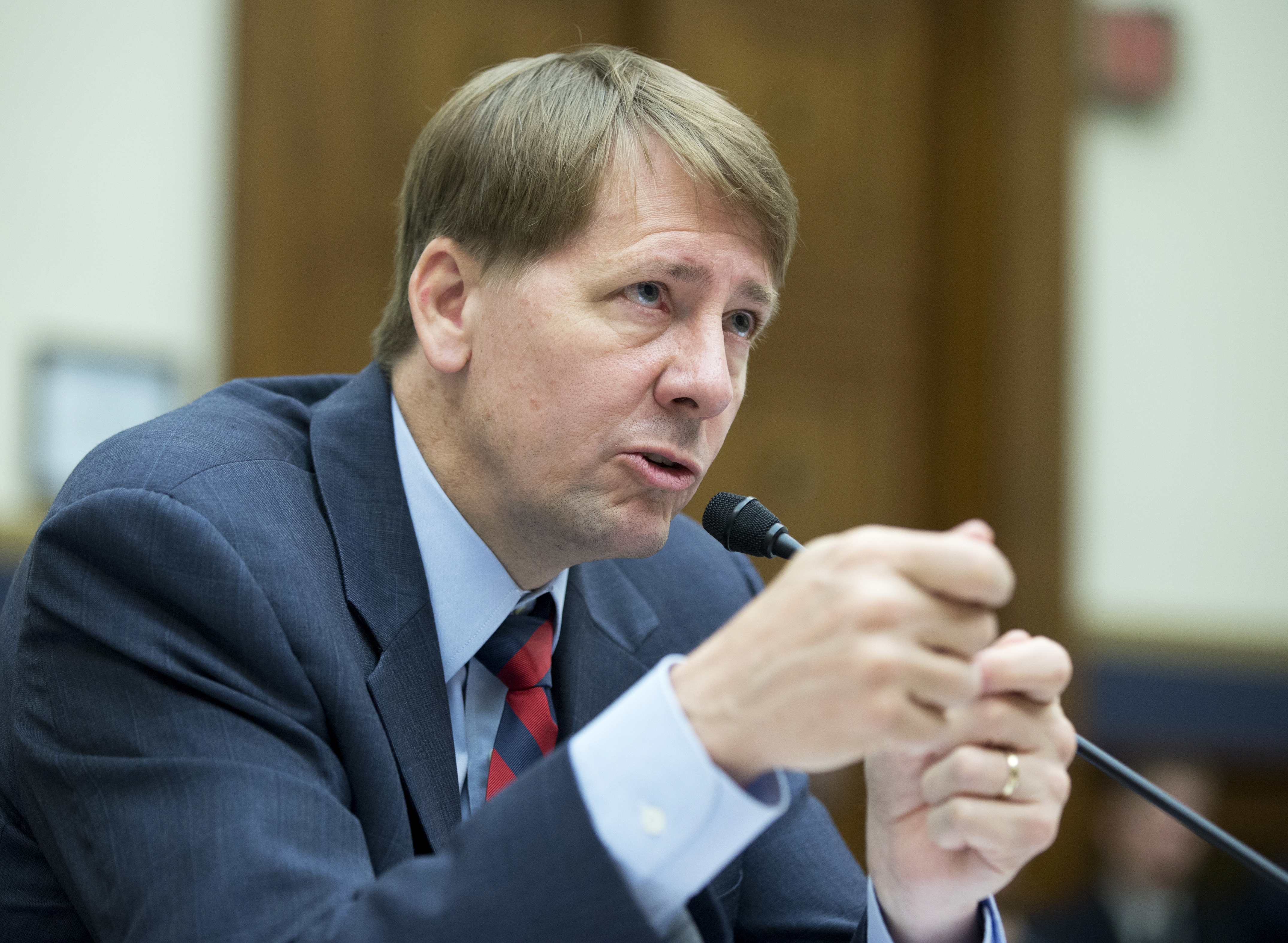 FILE - In this Sept. 12, 2013 file photo, Consumer Financial Protection Bureau (CFPB) Director Richard Cordray testifies on Capitol Hill in Washington. The CFPB on Thursday, June 25, 2015 is releasing the first batch of its highly awaited database of consumer complaints filed against local banks, credit card and mortgage companies. The 7,700 public narratives, collected starting in March 2015, are only a fraction of the 627,000 complaints the bureau has fielded since its inauguration in 2011. (AP Photo/Manuel Balce Ceneta, File) (AP)