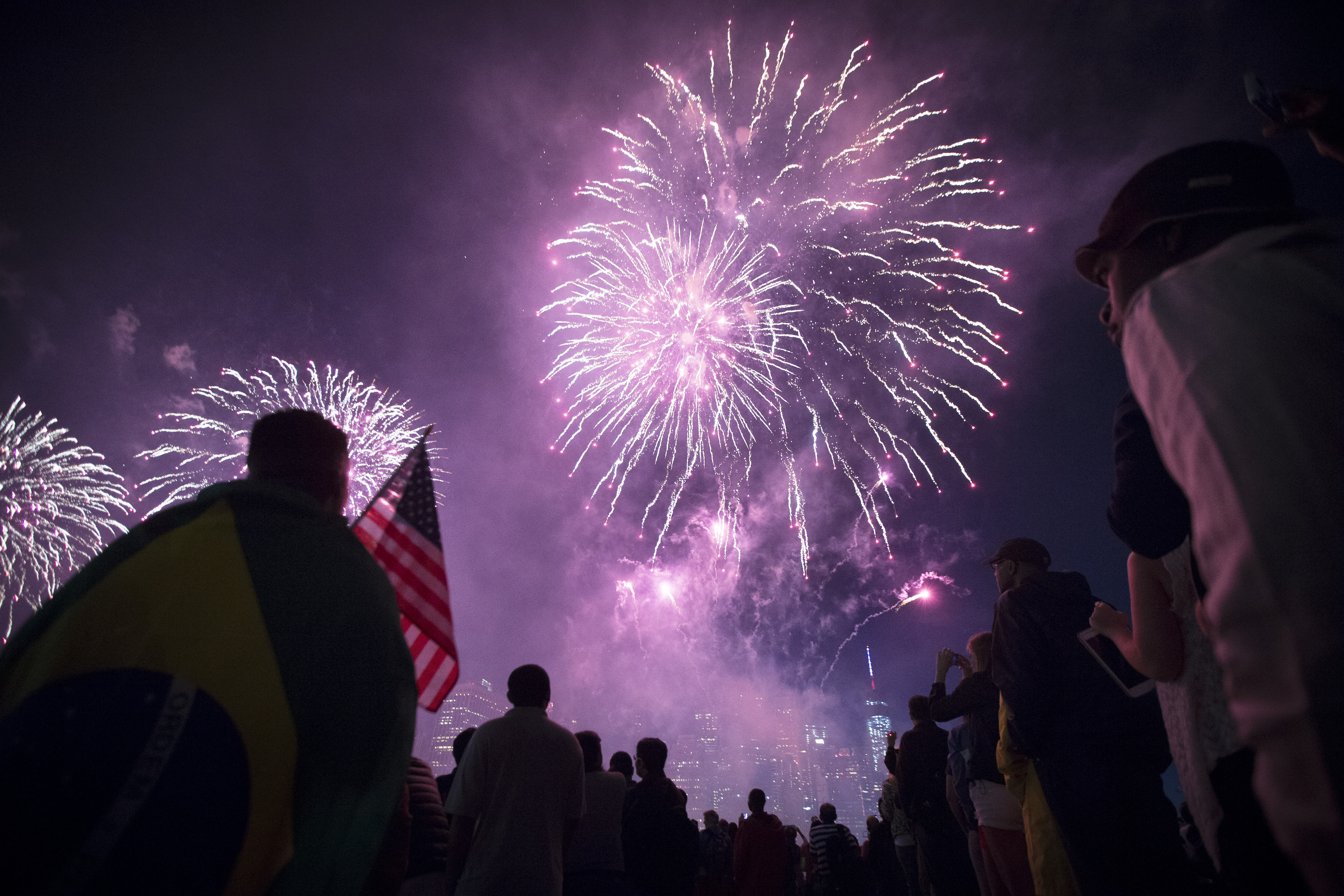 FILE - In this Friday, July 4, 2014 file photo, fireworks light up the lower Manhattan skyline during the Macy's Annual Fourth of July fireworks show in New York. On Tuesday, July 30, 2015, the Environmental Protection Agency said children, older adults, and people with heart disease, asthma or other lung diseases are considered to be particularly sensitive to particle pollution. The agency recommended that they limit their exposure by watching fireworks from upwind. (AP Photo/John Minchillo) (AP)