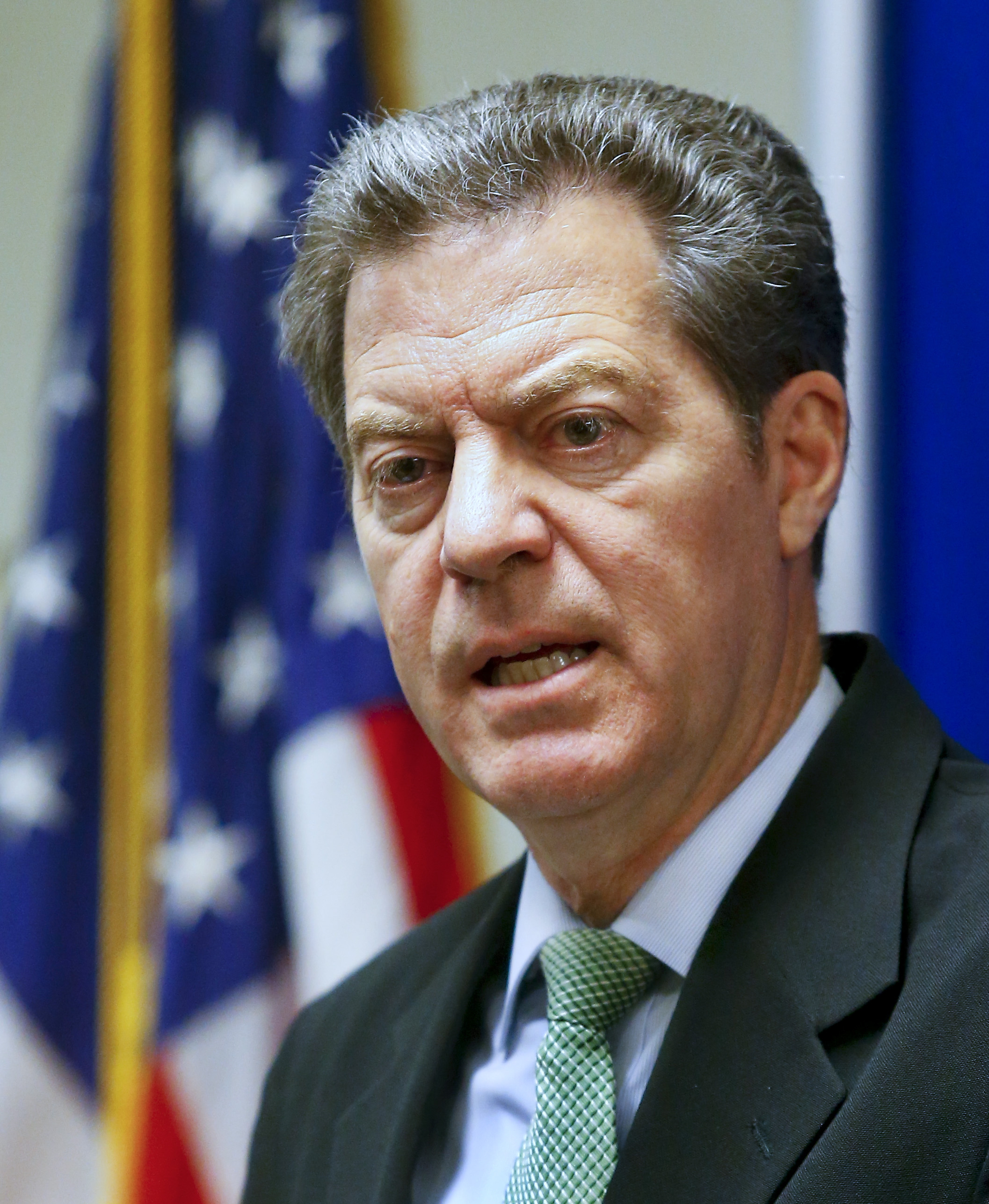 Kansas Gov. Sam Brownback addresses the media about the legislative session during a press conference on Tuesday June 16, 2015, at the Kansas Statehouse in Topeka, Kan.  (Chris Neal/The Topeka Capital-Journal via AP) (AP)