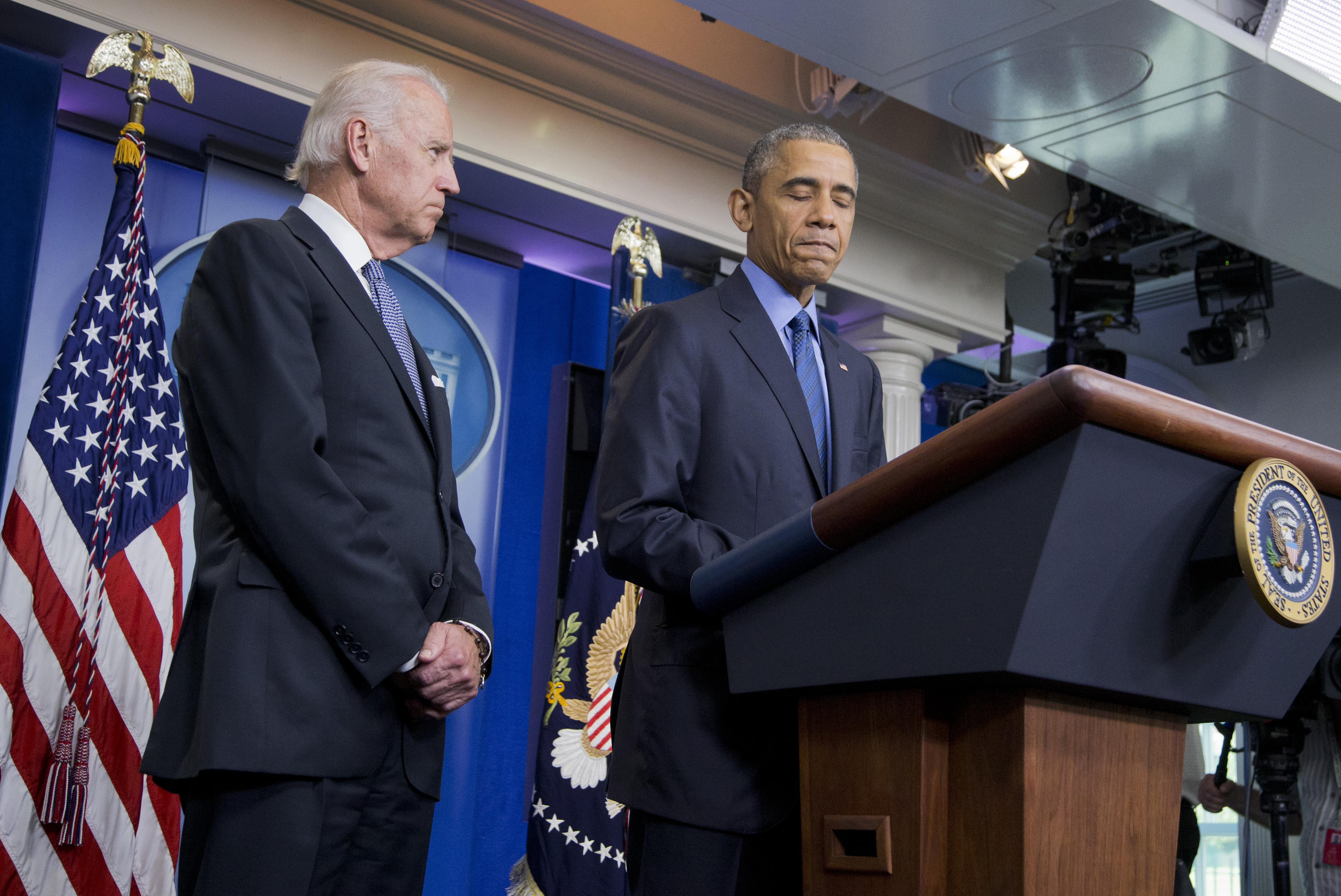 President Barack Obama, accompanied by Vice President Joe Biden, pauses while speaking in the Brady Press Briefing Room of the White House in Washington, Thursday, June 18, 2015, on the church shooting in Charleston, S.C., prior to his departure to Los Angeles. (AP/Manuel Balce Ceneta)
