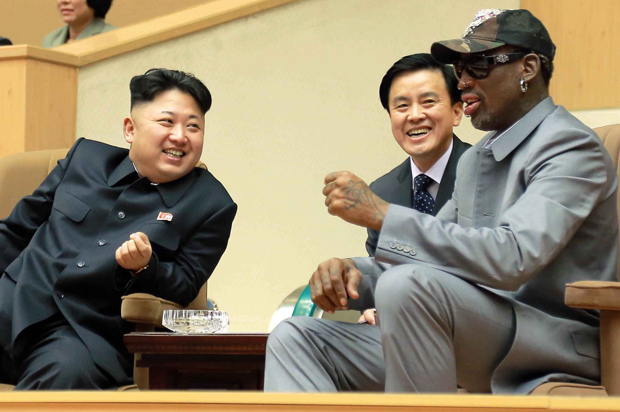 Kim Jong-un watches a basketball game with Dennis Rodman at Pyongyang Indoor Stadium in this undated photo released by Korean Central News Agency, Jan. 9, 2014. (Reuters/KCNA)