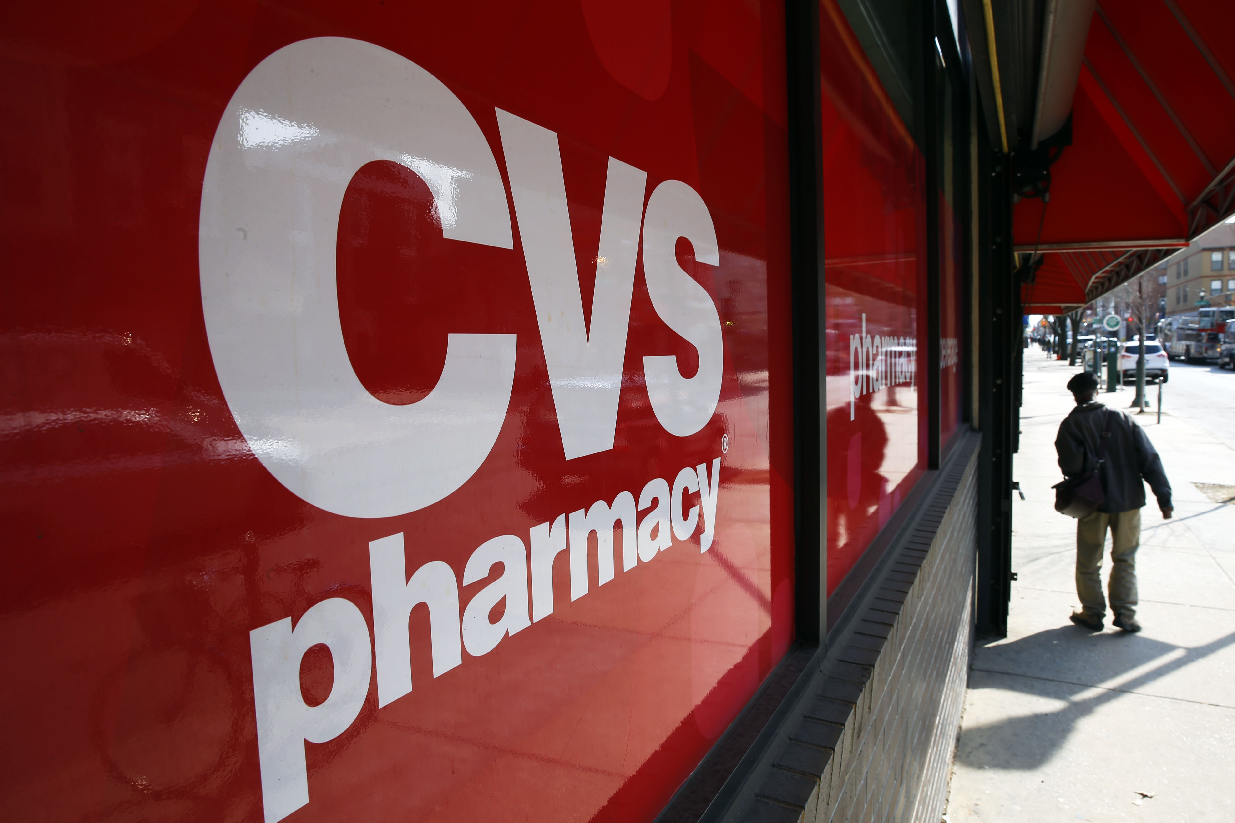 FILE - This March 25, 2014, file photo, shows a CVS store in Philadelphia. Target announced Monday, June 15, 2015, that it is selling its pharmacy and clinic businesses to drugstore chain CVS Health for about $1.9 billion in a deal that combines the resources of two retailers seeking to polish their reputations as health care providers. (AP Photo/Matt Rourke, File) (AP)