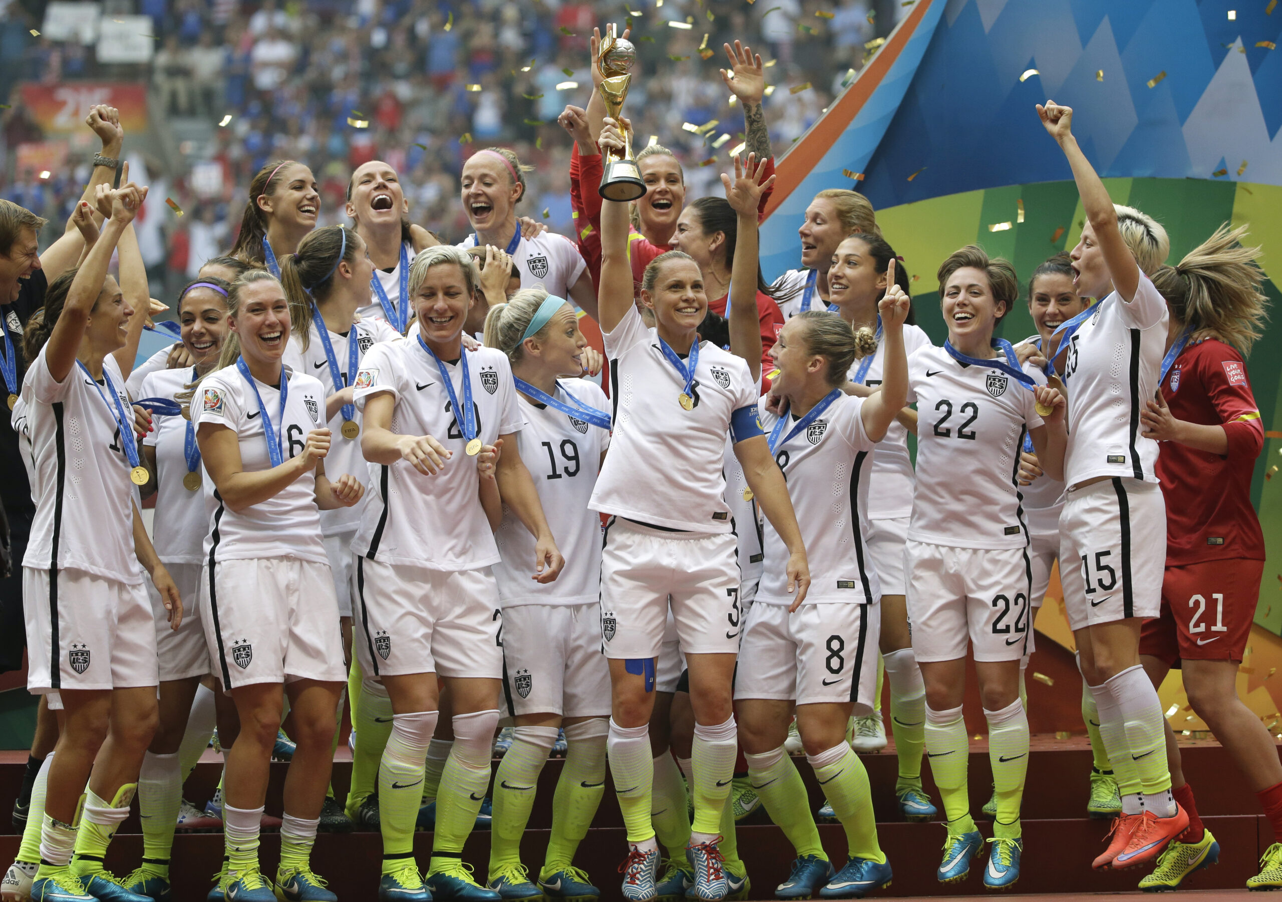 The United States Women's National Team celebrates with the trophy after they beat Japan 5-2 in the FIFA Women's World Cup soccer championship in Vancouver, British Columbia, Canada, Sunday, July 5, 2015. (AP Photo/Elaine Thompson) (AP/Elaine Thompson)
