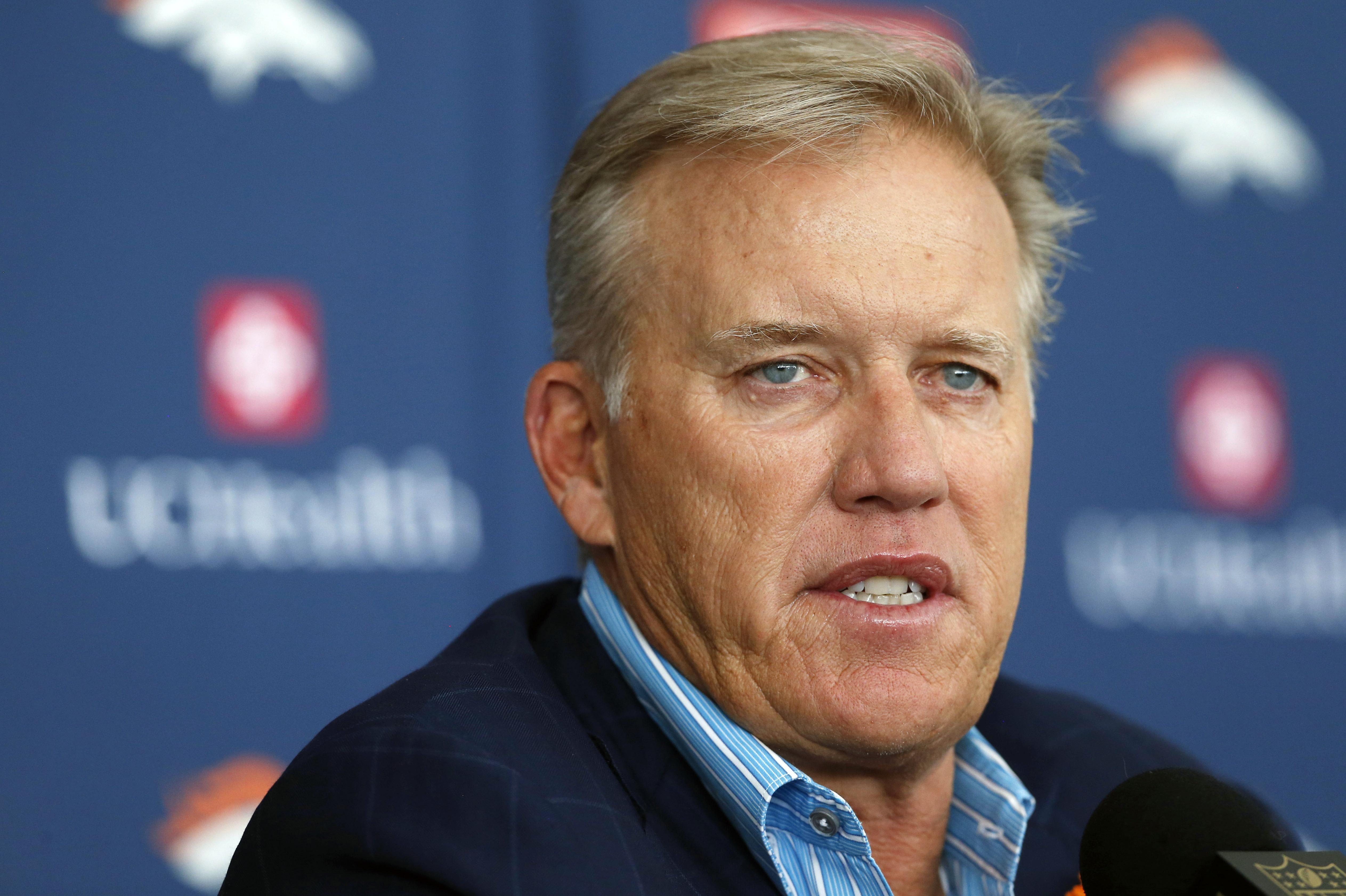 John Elway, general manager of the Denver Broncos, responds to questions during a news conference at the team's NFL football training camp Thursday, July 30, 2015, in Englewood, Colo. () (AP Photo/David Zalubowski)