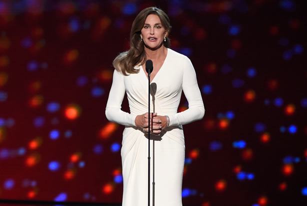 Soccer player Abby Wambach, of the United States women's national soccer team, left, looks on as Caitlyn Jenner accepts the Arthur Ashe award for courage at the ESPY Awards at the Microsoft Theater on Wednesday, July 15, 2015, in Los Angeles. (Photo by Chris Pizzello/Invision/AP)