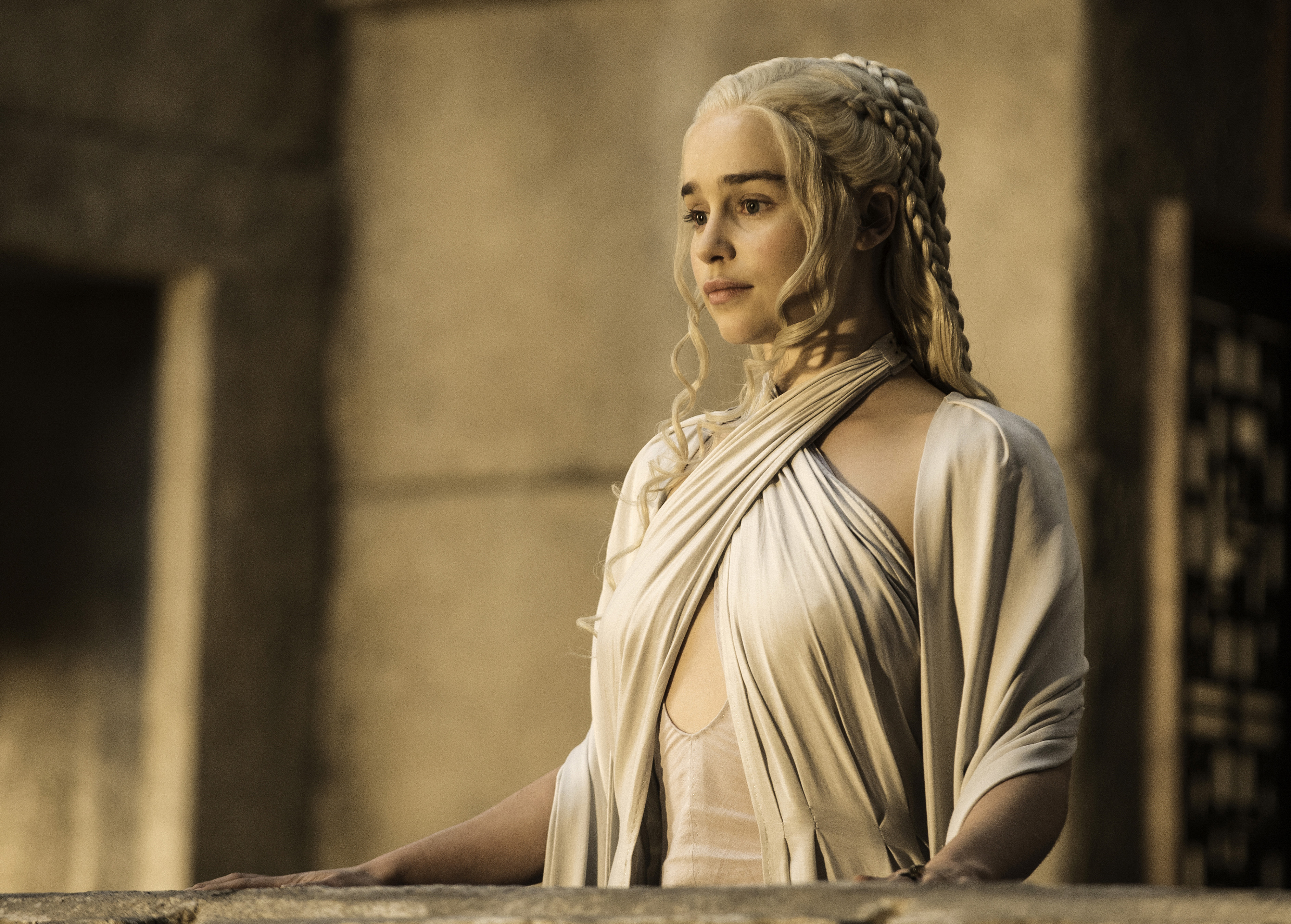 In this image released by HBO, Emilia Clarke appears in a scene from "Game of Thrones. Clarke was nominated for an Emmy Award on Thursday, July 16, 2015, for outstanding supporting actress in a drama series for her role on the show. The 67th Annual Primetime Emmy Awards will take place on Sept. 20, 2015.  (Helen Sloane/HBO via AP) (AP)
