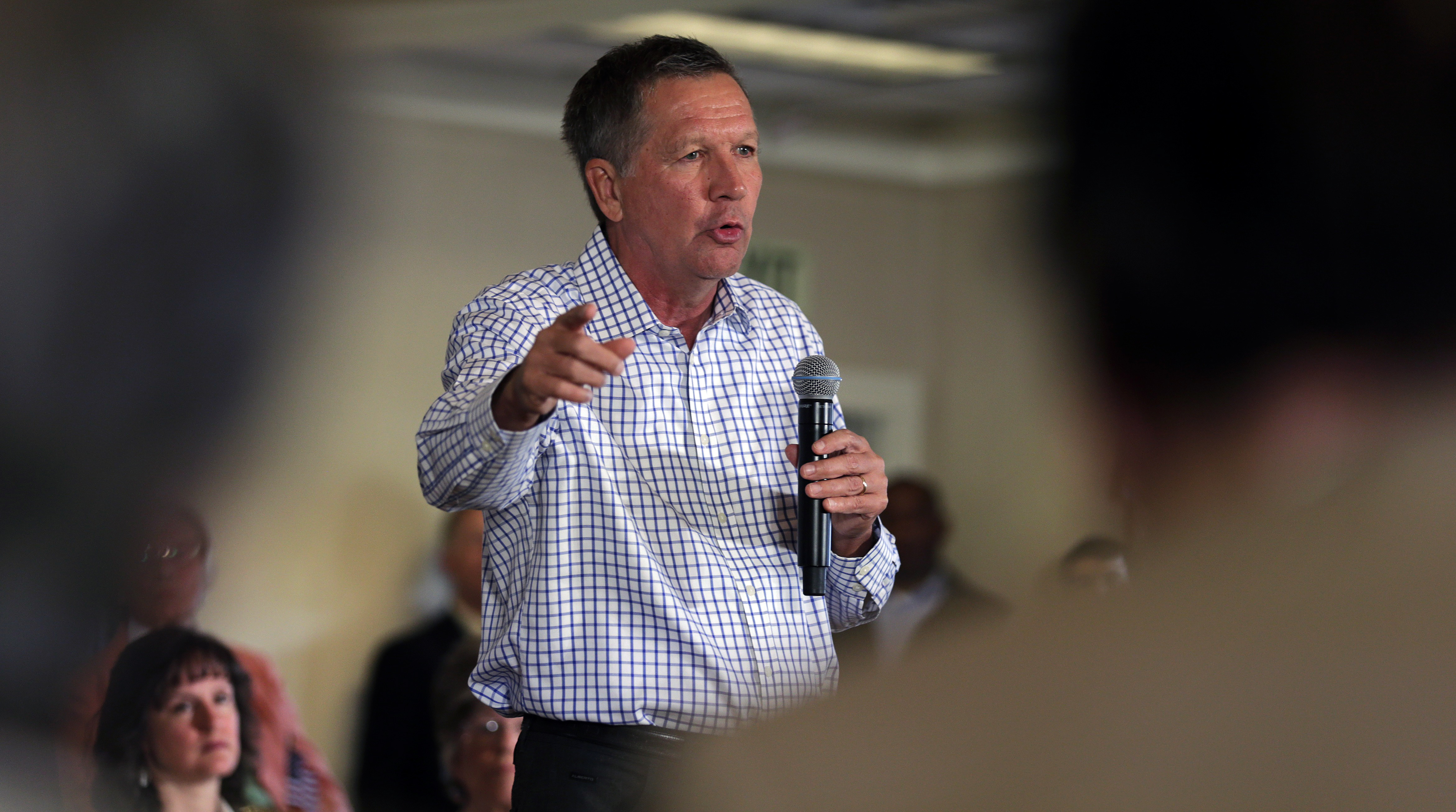 Republican presidential candidate Ohio Gov. John Kasich addresses a gathering at a town hall style meeting during a campaign stop in Greenland, N.H., Wednesday, July 22, 2015. (AP Photo/Charles Krupa) (AP)