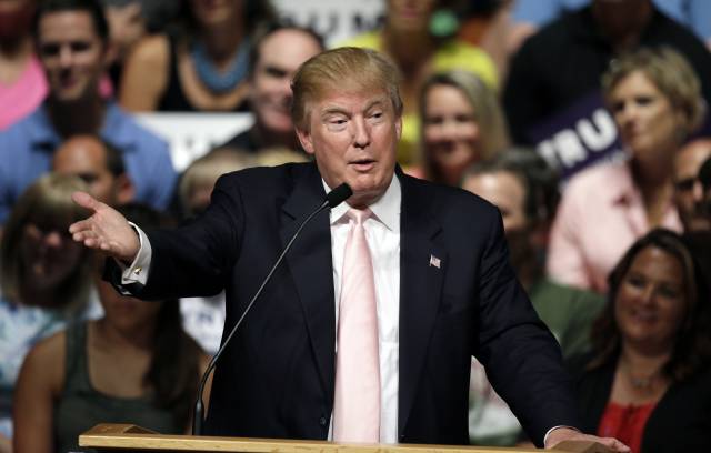 Republican presidential candidate Donald Trump speaks at a rally and picnic (AP Photo/Charlie Neibergall)