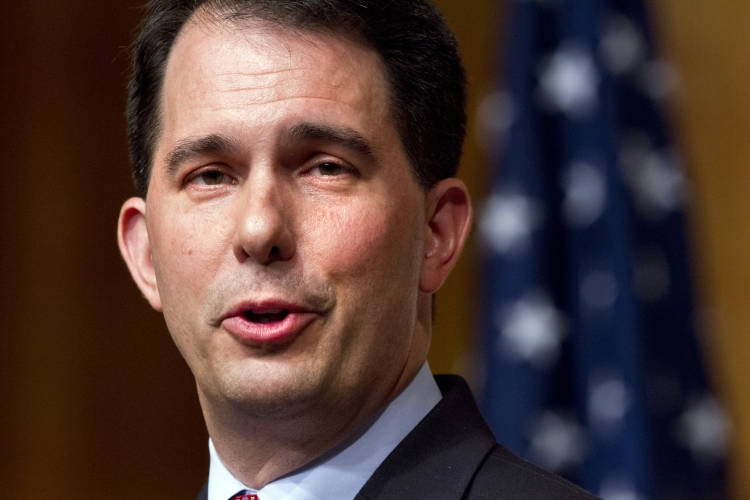 FILE - In this June 20, 2015 file photo, Republican presidential candidate, Wisconsin Gov. Scott Walker speaks in Washington. Walker is facing potentially embarrassing revelations from an agency once billed as the centerpiece of his plan as Wisconsins governor to bring 250,000 jobs to the state. Walker led the Wisconsin Economic Development Corporation until stepping down earlier this month after allegations about shoddy lending and favoritism at the agency.  (AP Photo/Jacquelyn Martin, File) (AP)